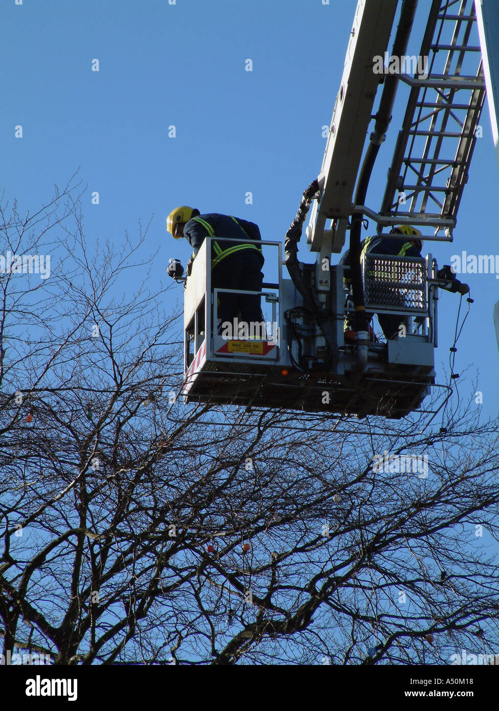 Oxfordshire Fire and Rescue taking down Christmas lights Stock Photo