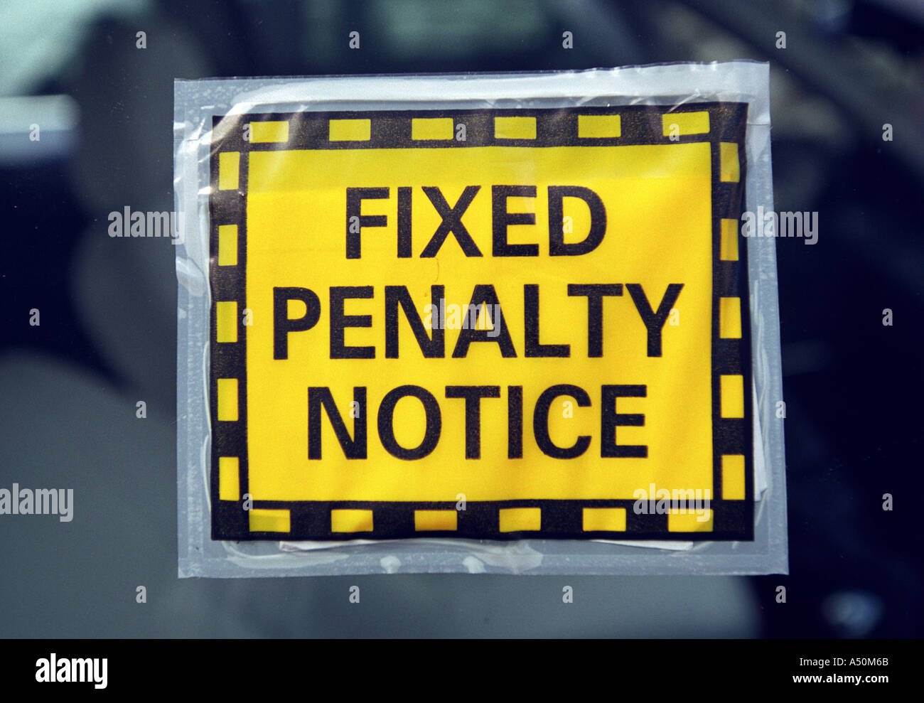 A Fixed Penalty Notice on a car windscreen Stock Photo