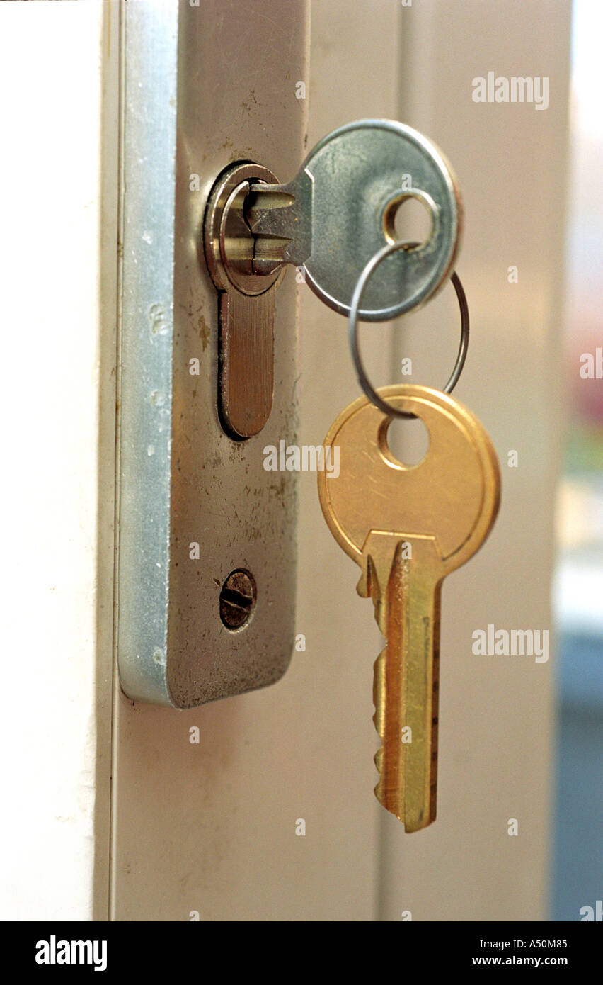 Key in a lock Stock Photo Alamy