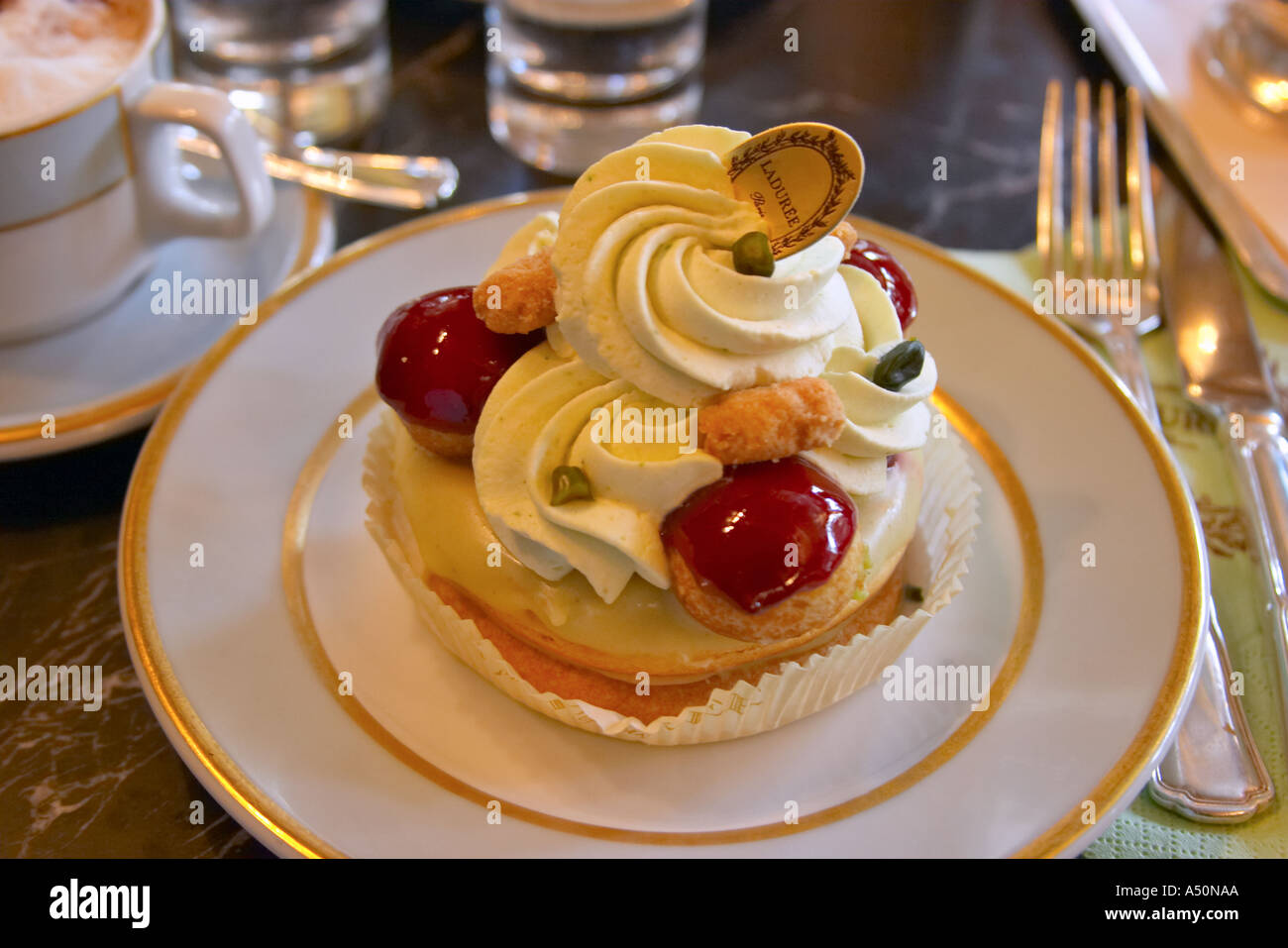 Cake and coffee at Laduree in Paris France Stock Photo