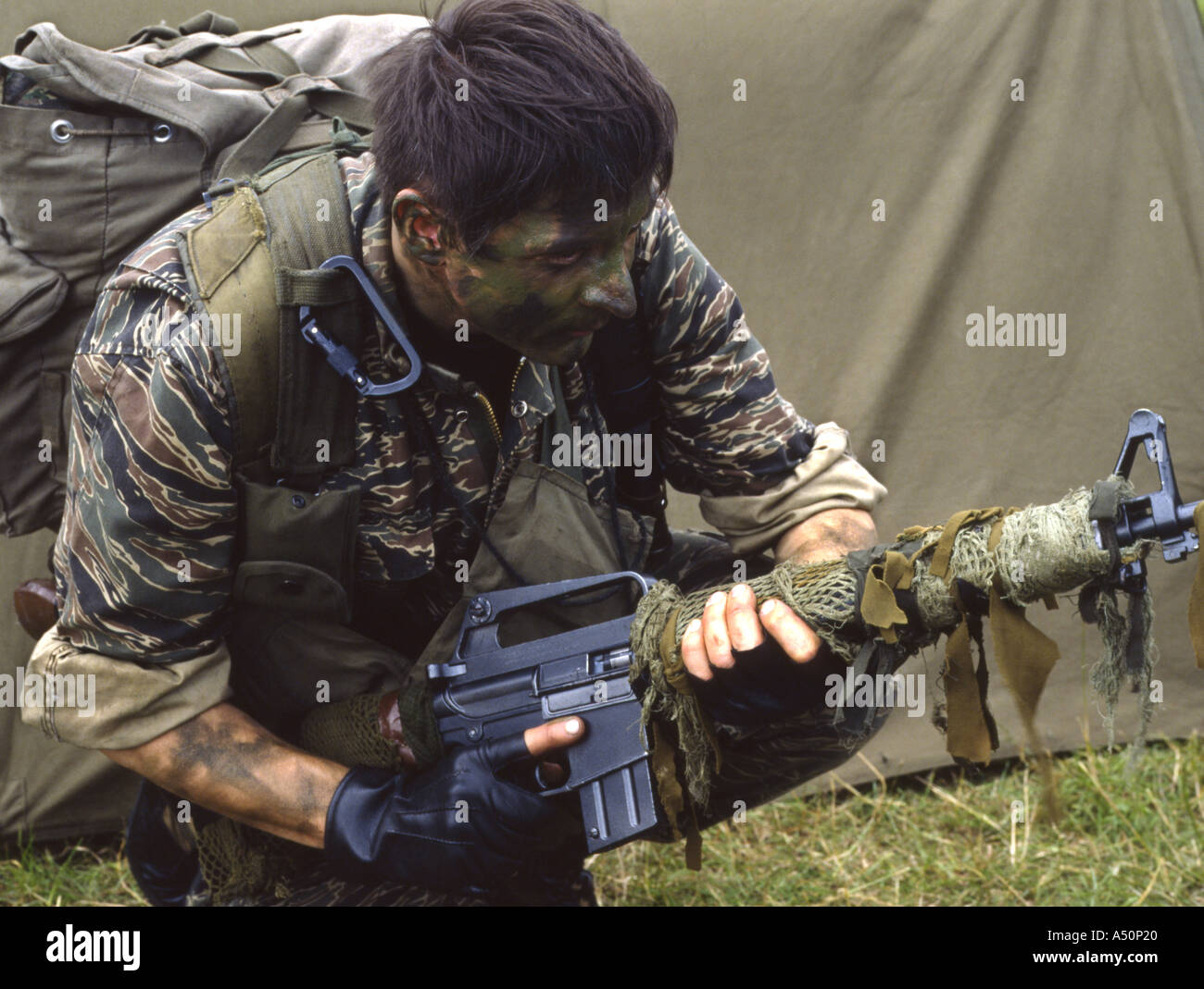 Military club enthusiast equipped as US special forces soldier in Vietnam Stock Photo