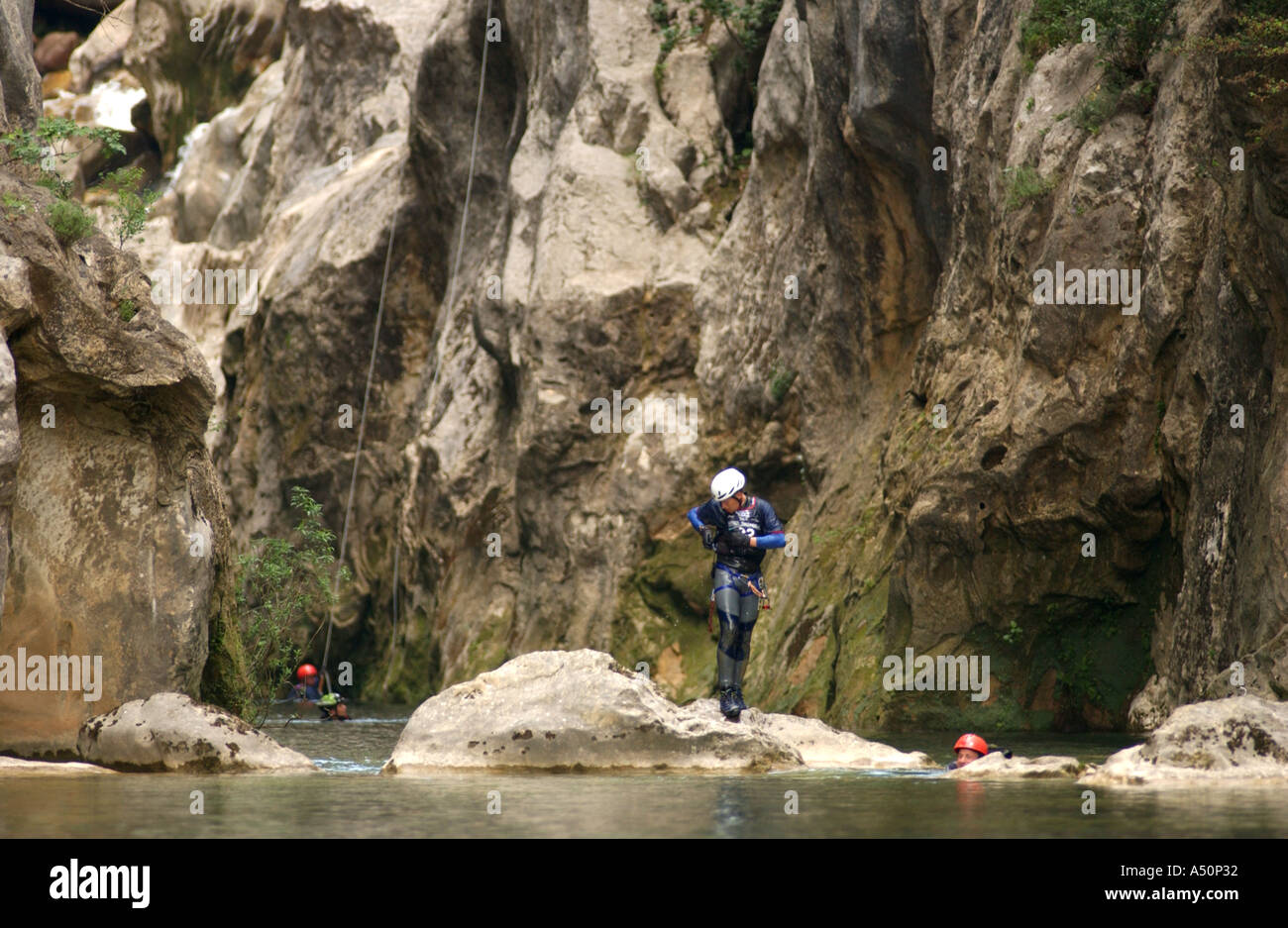 Adventure race athlete canyoneering Stock Photo Alamy