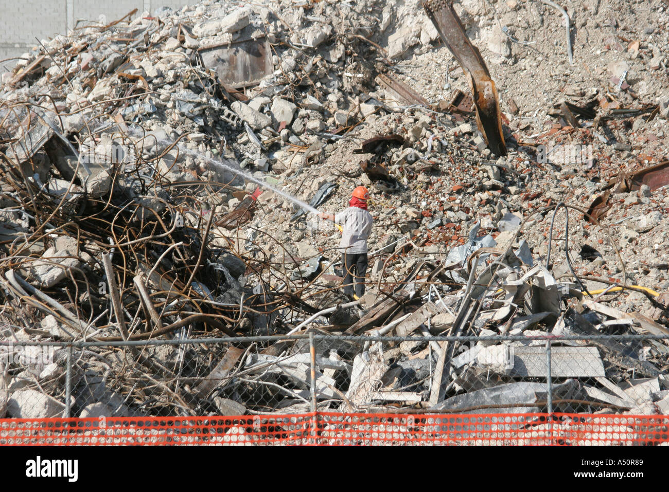 Miami Florida,Biscayne Boulevard,imploded building debris,hosing down ...