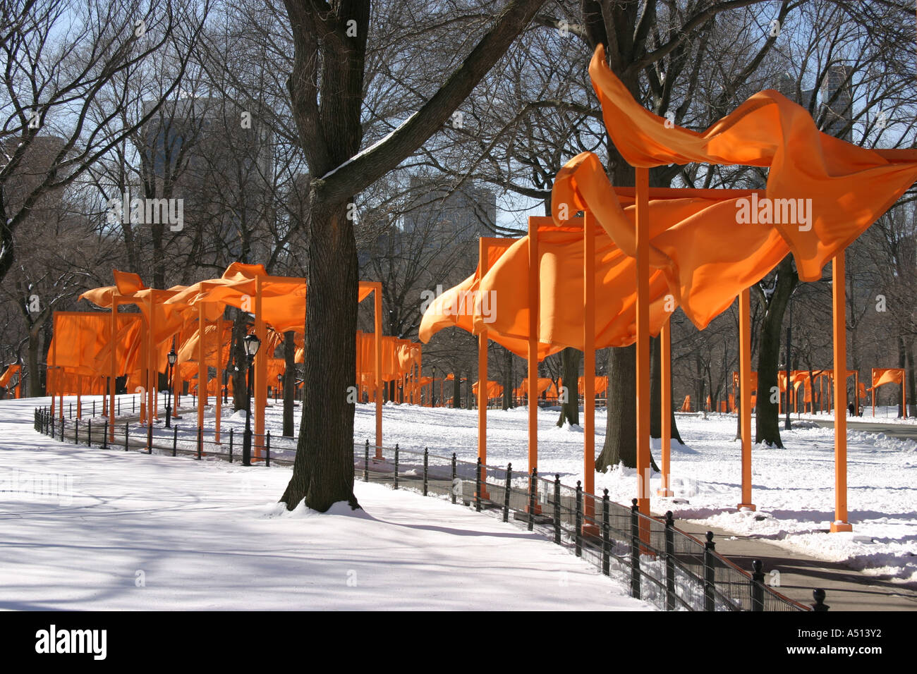 Suffron coloured gates in the wind.  Christo and Jeanne-Claude exhibition Central Park, New York Stock Photo