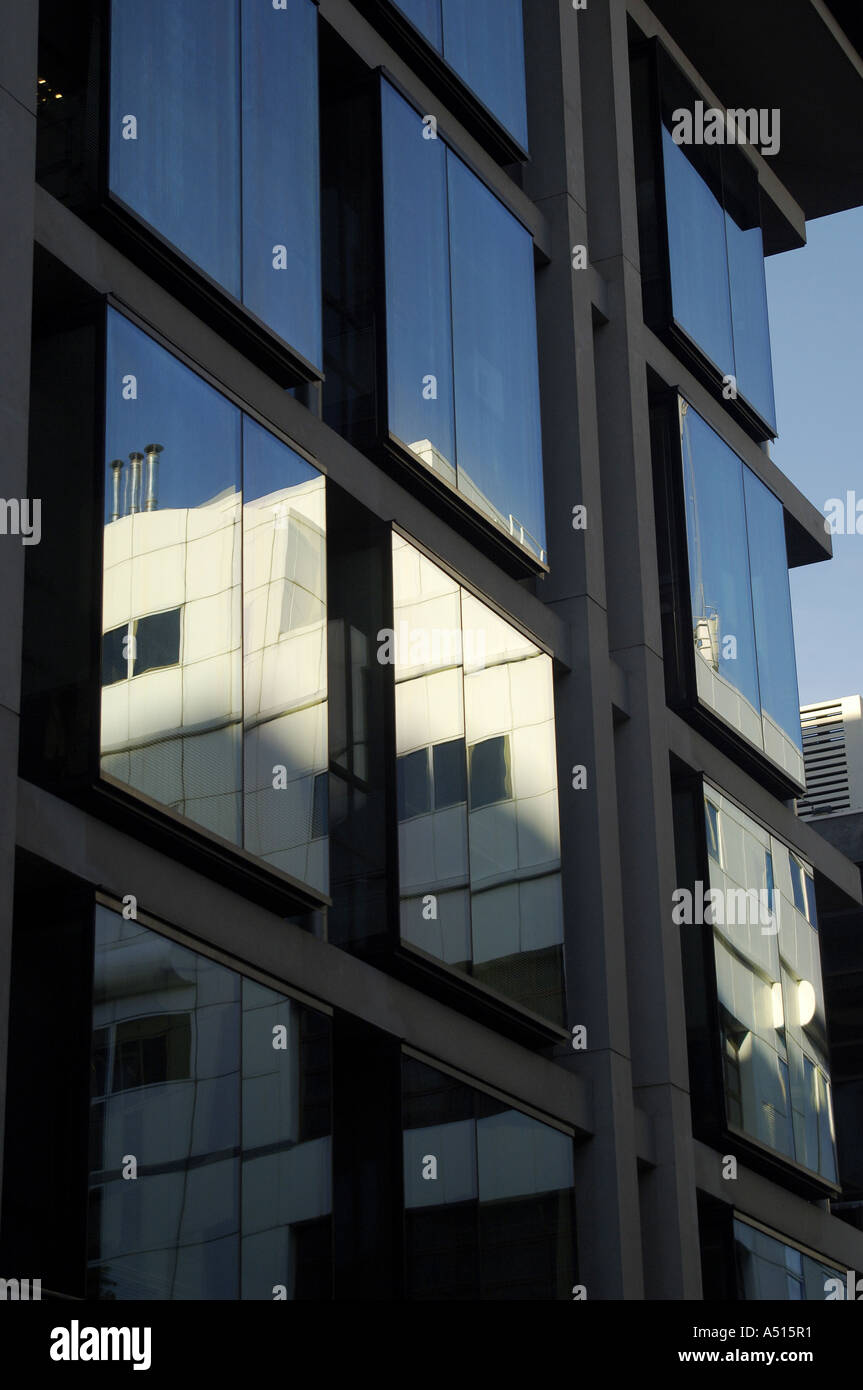London City Skyline. Reflection in office windows Stock Photo Alamy