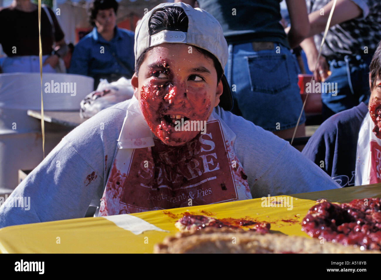 Pie eating contestant at state fair Stock Photo