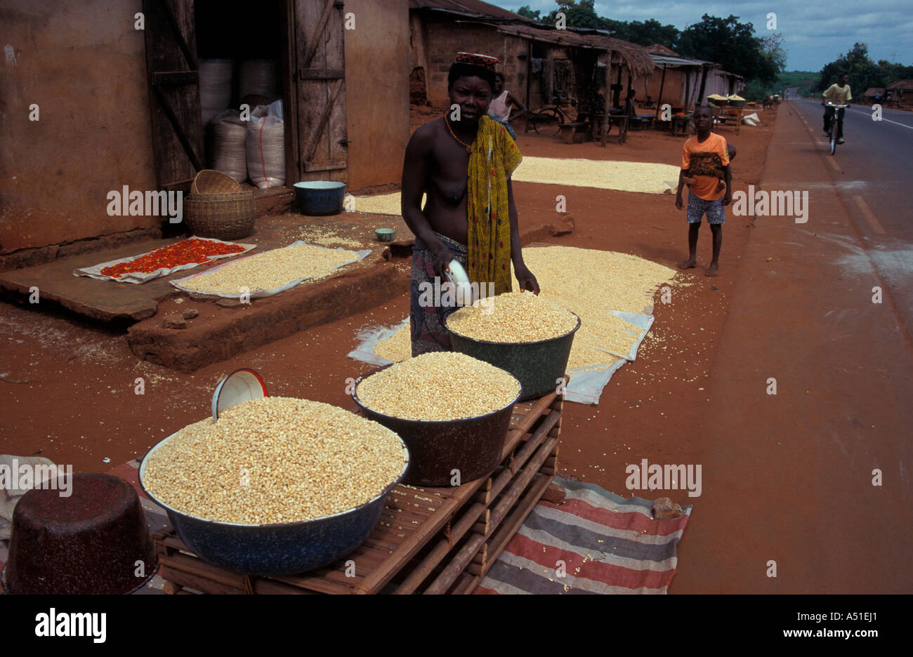 North of Allada Massi village corn drying and being sold Benin Stock