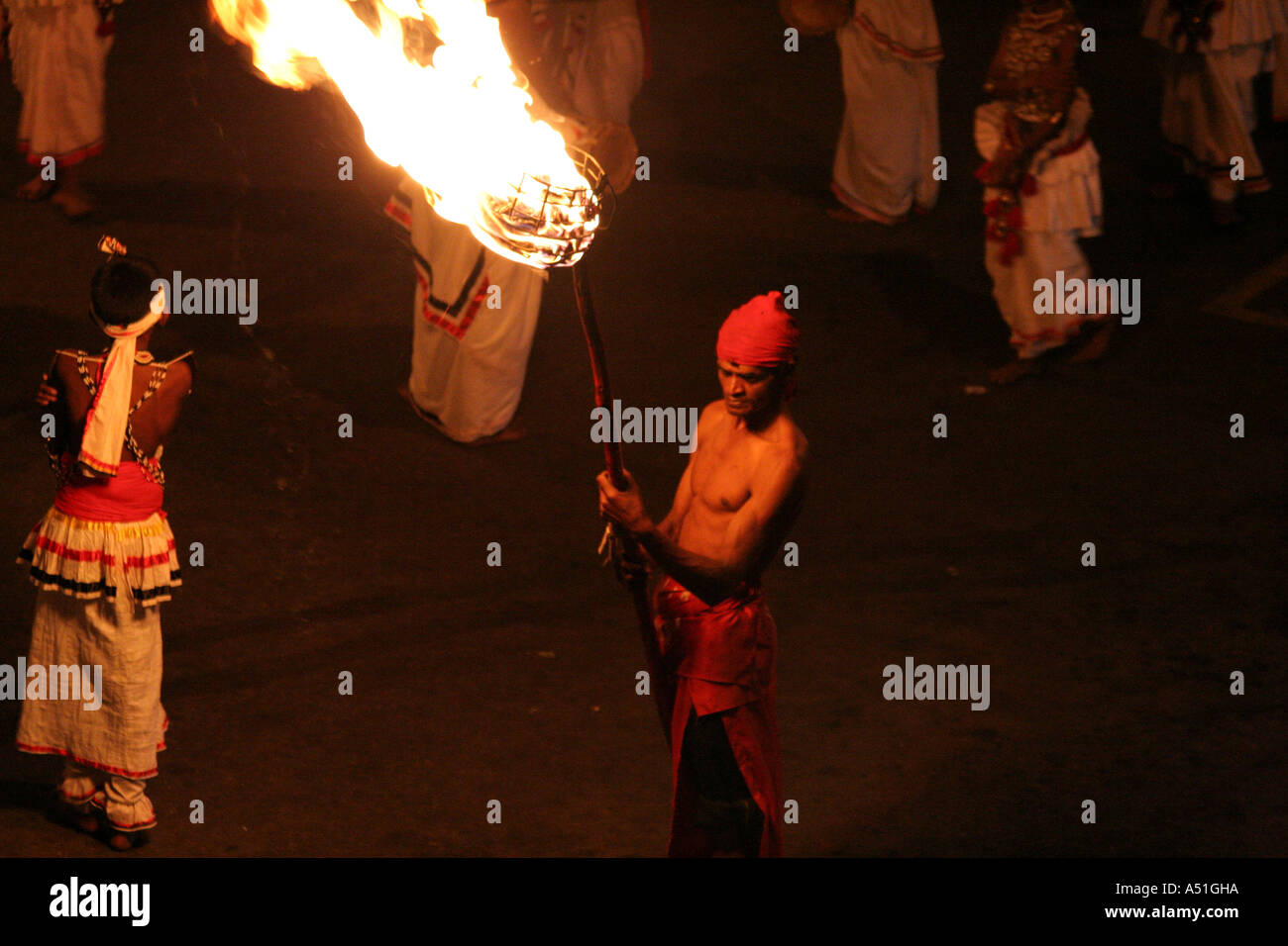 Torch bearer in the great Kandy Esala Perahera festival in Kandy, Sri