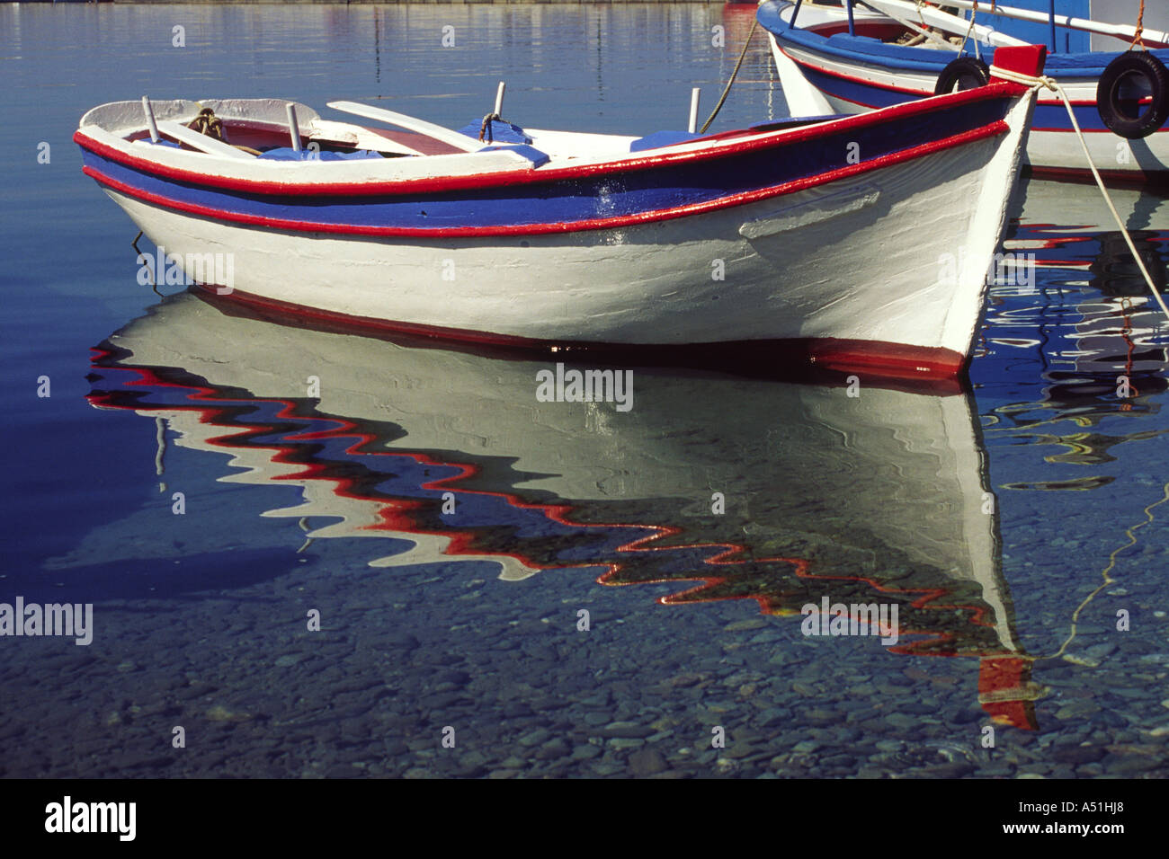 Rowing Boat in the harbour of Skopelos Greece Europe EU Stock Photo