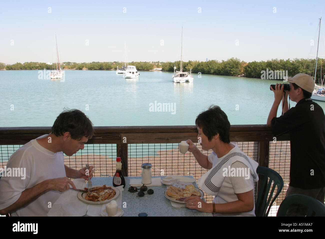 Miami Florida Key Biscayne Bill Baggs Cape Florida State Park Boater S Grill No Name Harbor Harbour Binoculars Boy Boys Lad Lads Male Kid Kids Child C Stock Photo Alamy