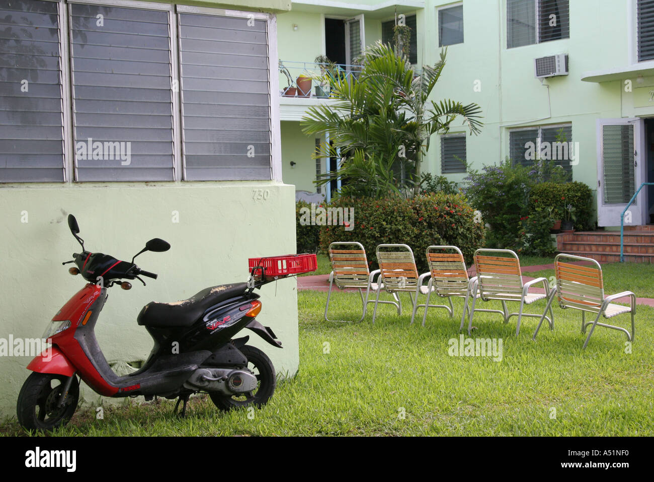 Miami Beach Florida,15th Street,motor scooter scooters,transportation