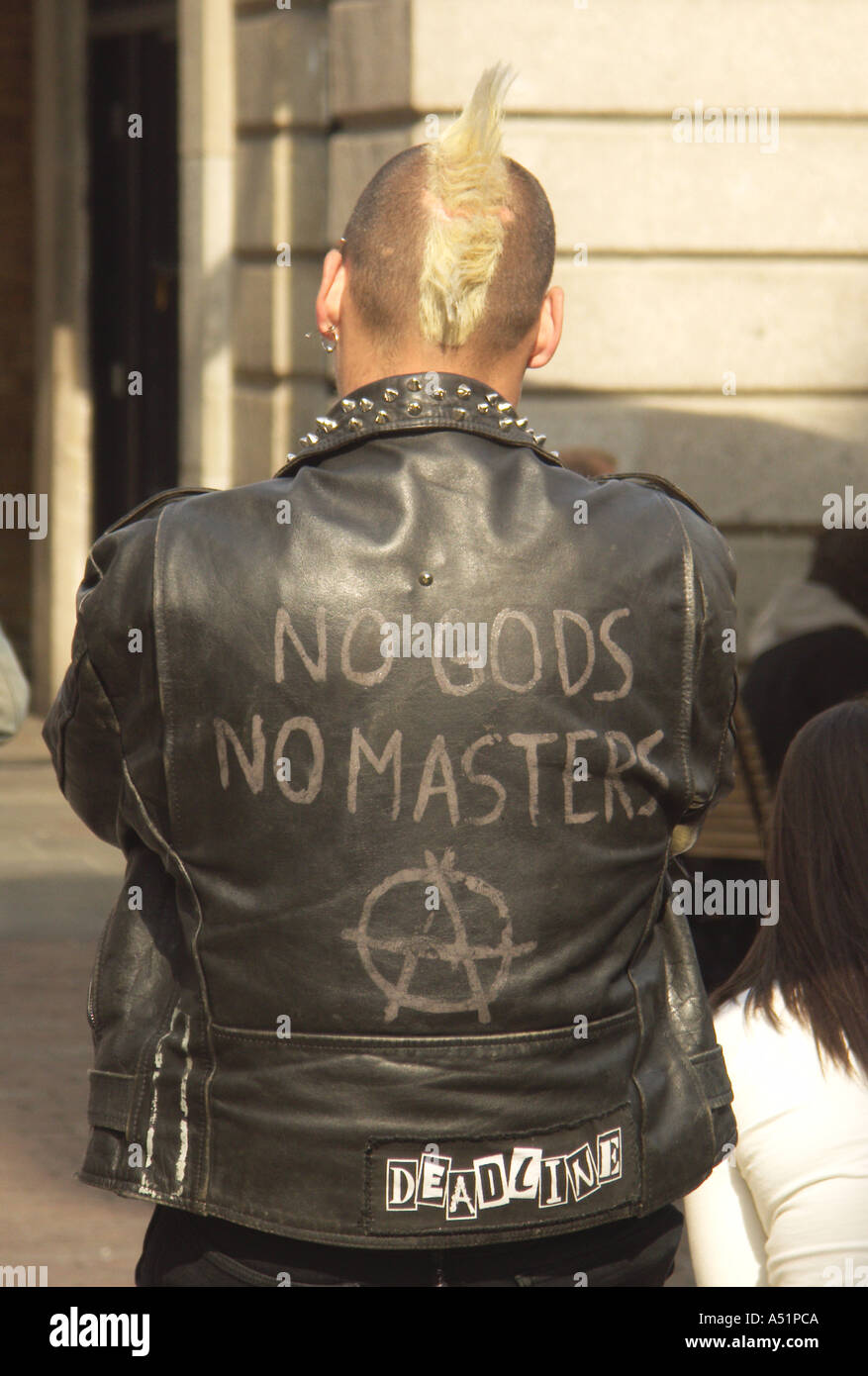 Back view of male punk wearing black leather jacket Covent Garden London  England Stock Photo - Alamy