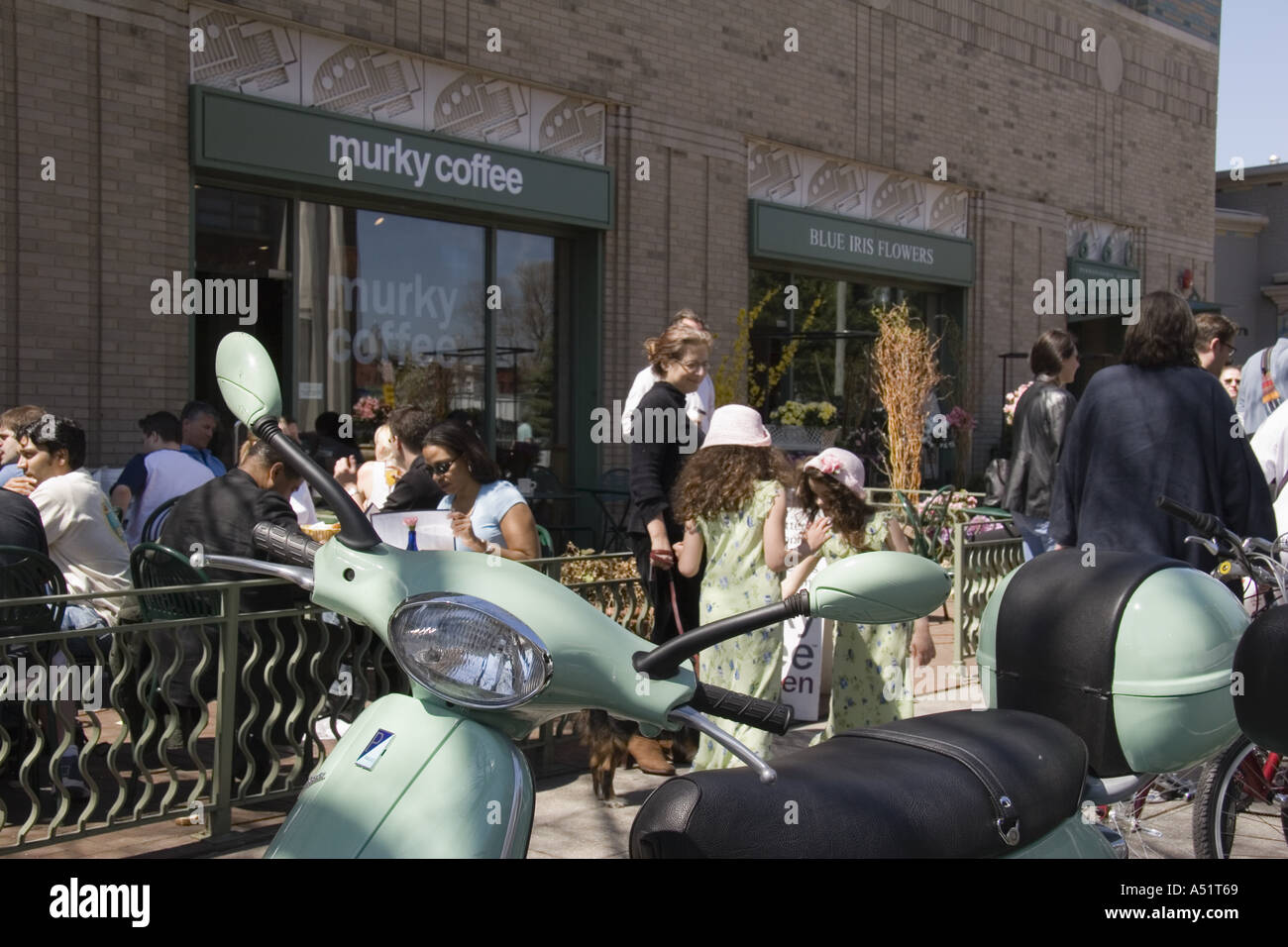 People at outside tables at Murky Coffee cafe and restaurant on 7th Street near Eastern Market Washington DC Stock Photo
