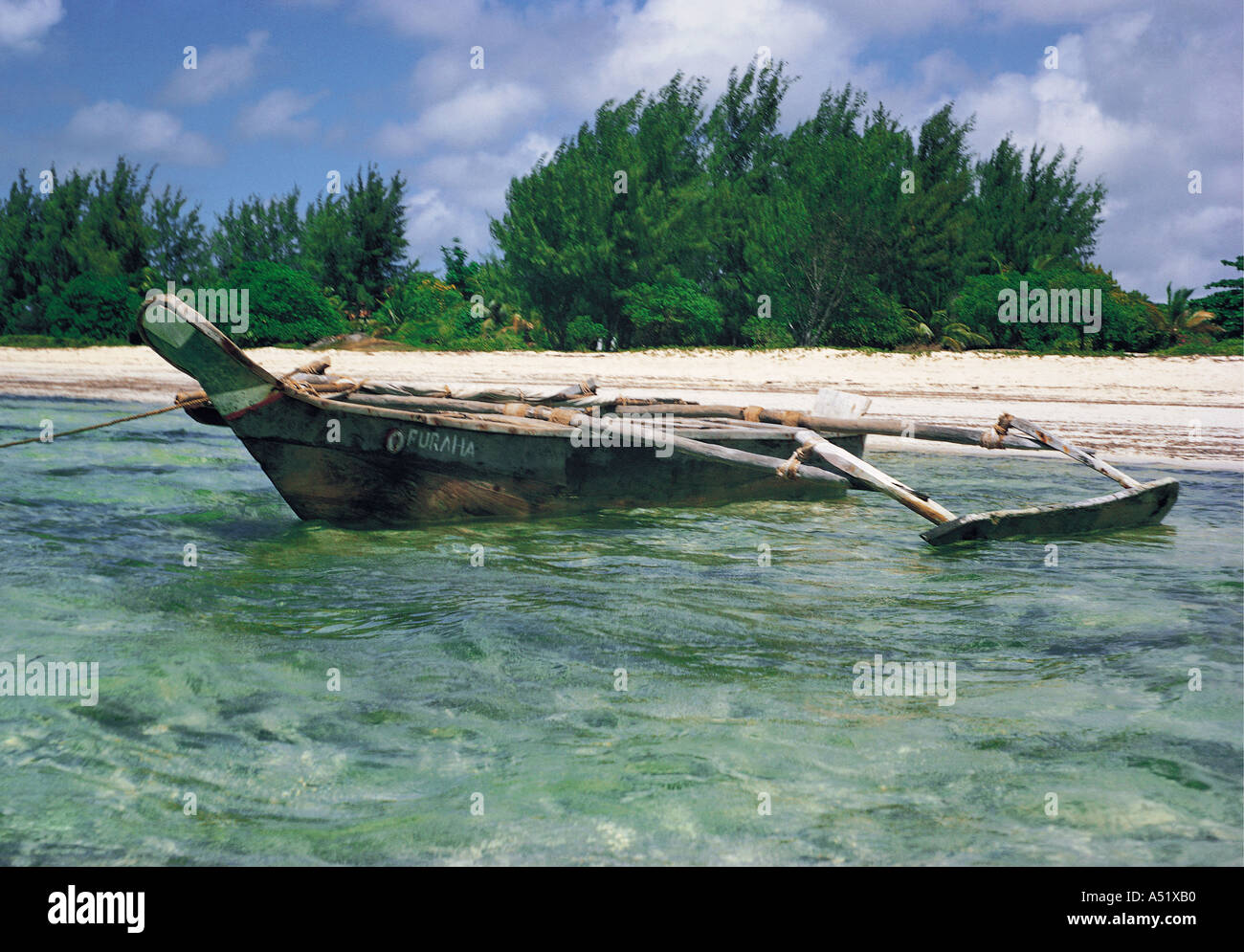Traditional Giriama wooden sailing canoe with outriggers Malindi Kenya