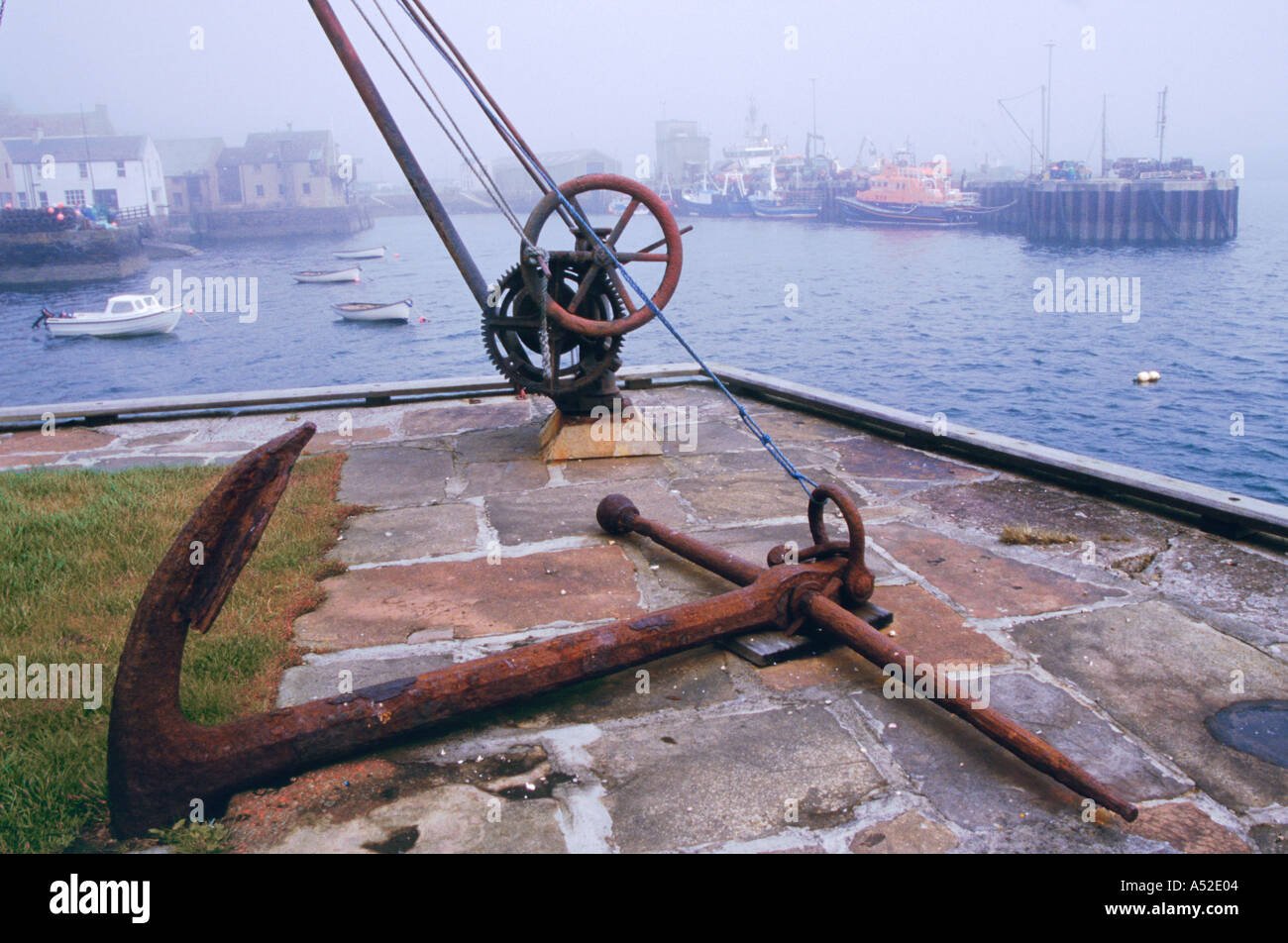 Foggy morning in Stromness with Anchor Stock Photo