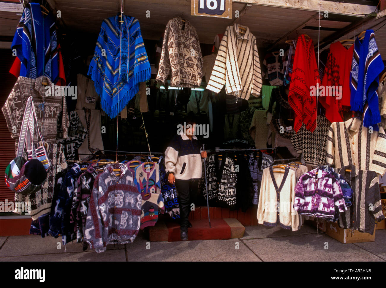 1, one, Chilean woman, adult woman, salesclerk, seller, selling, woolen clothes, souvenirs, clothing store, Puerto Montt, Chile, South America Stock Photo