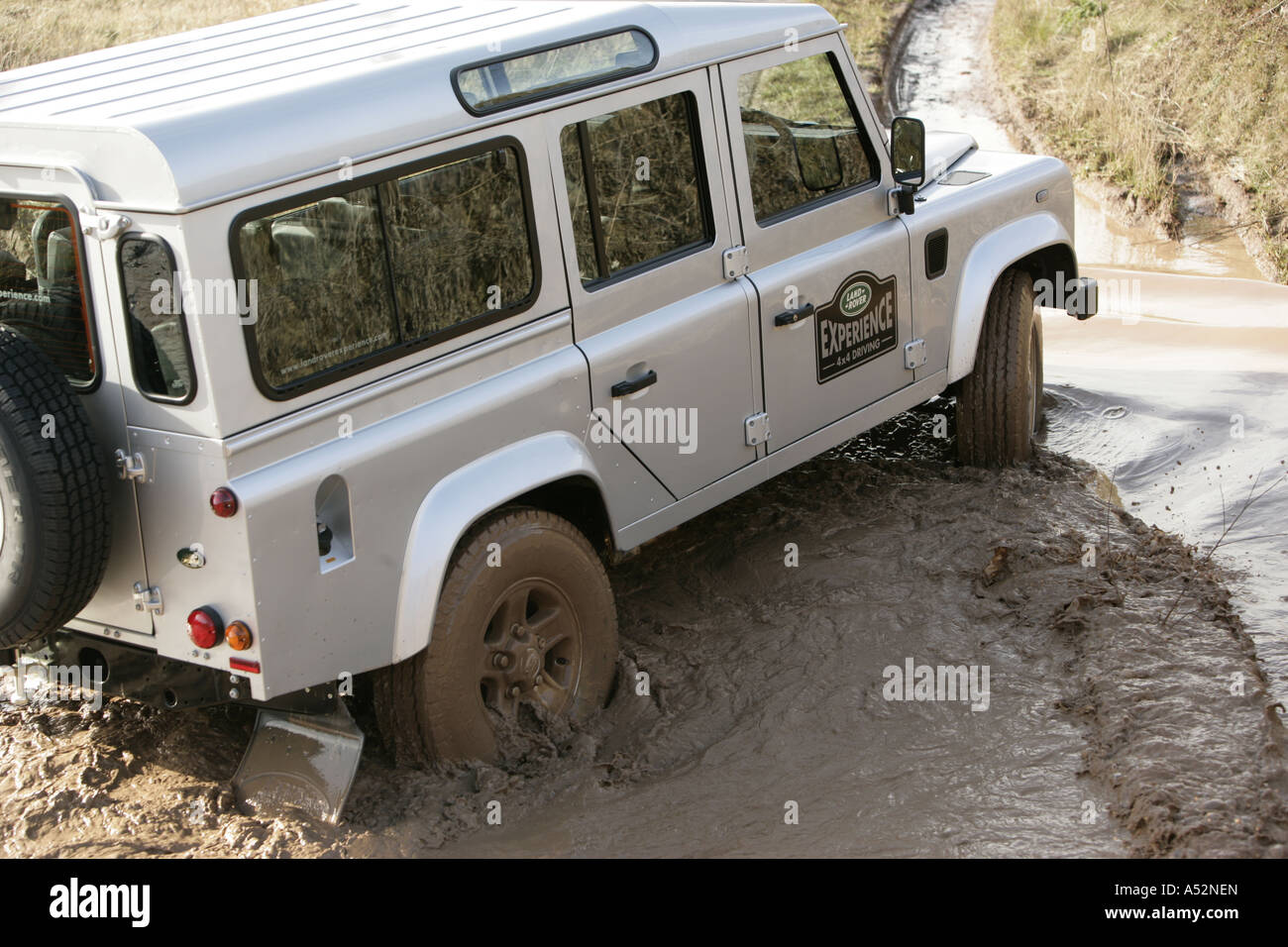 Land Rover Defender on an off-road course at the Land Rover factory in Solihull, West Midlands Stock Photo