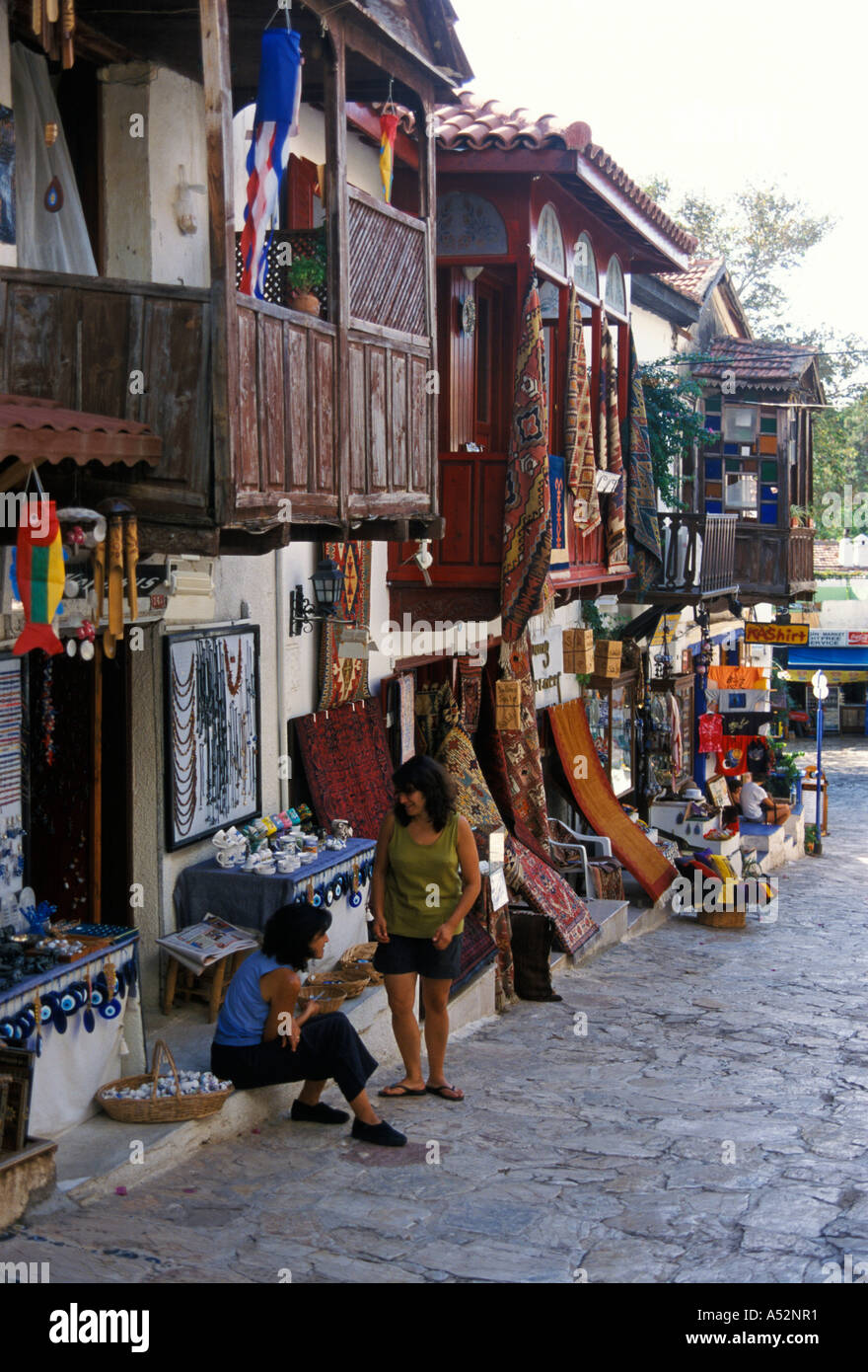 Kas Lykien Lykia west Southcoast Turkey romantic fishervillage at the mediteranean coast wodden balconies with souvenit shops in Stock Photo