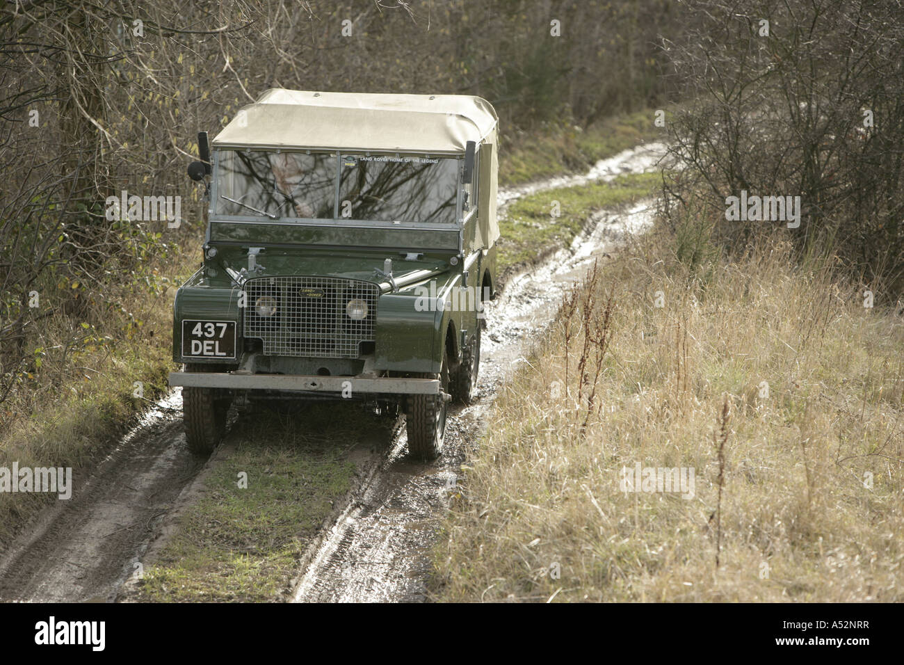 Series One Land Rover on an off-road course at the Land Rover factory in Solihull, West Midlands Stock Photo
