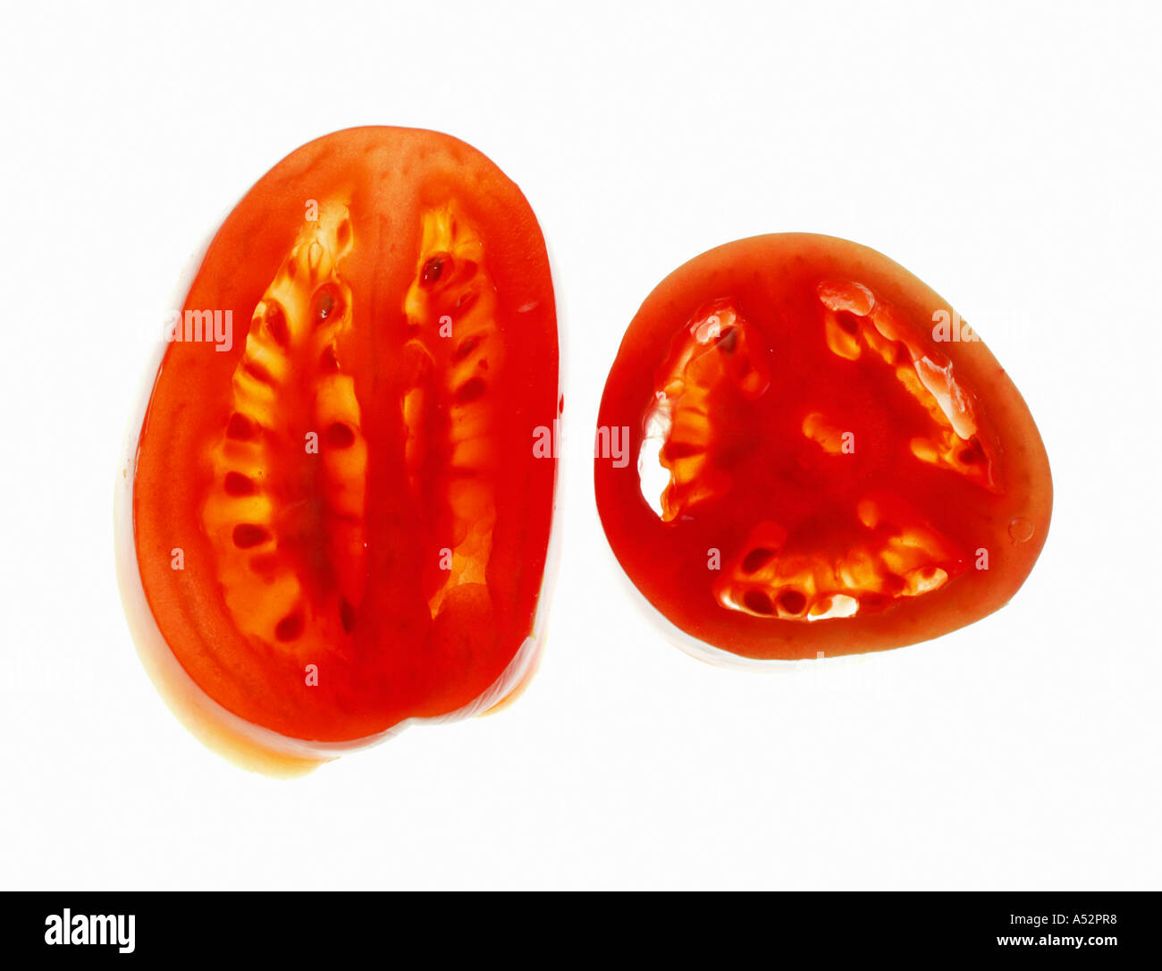 Plum tomato longitudinal and cross sections Stock Photo