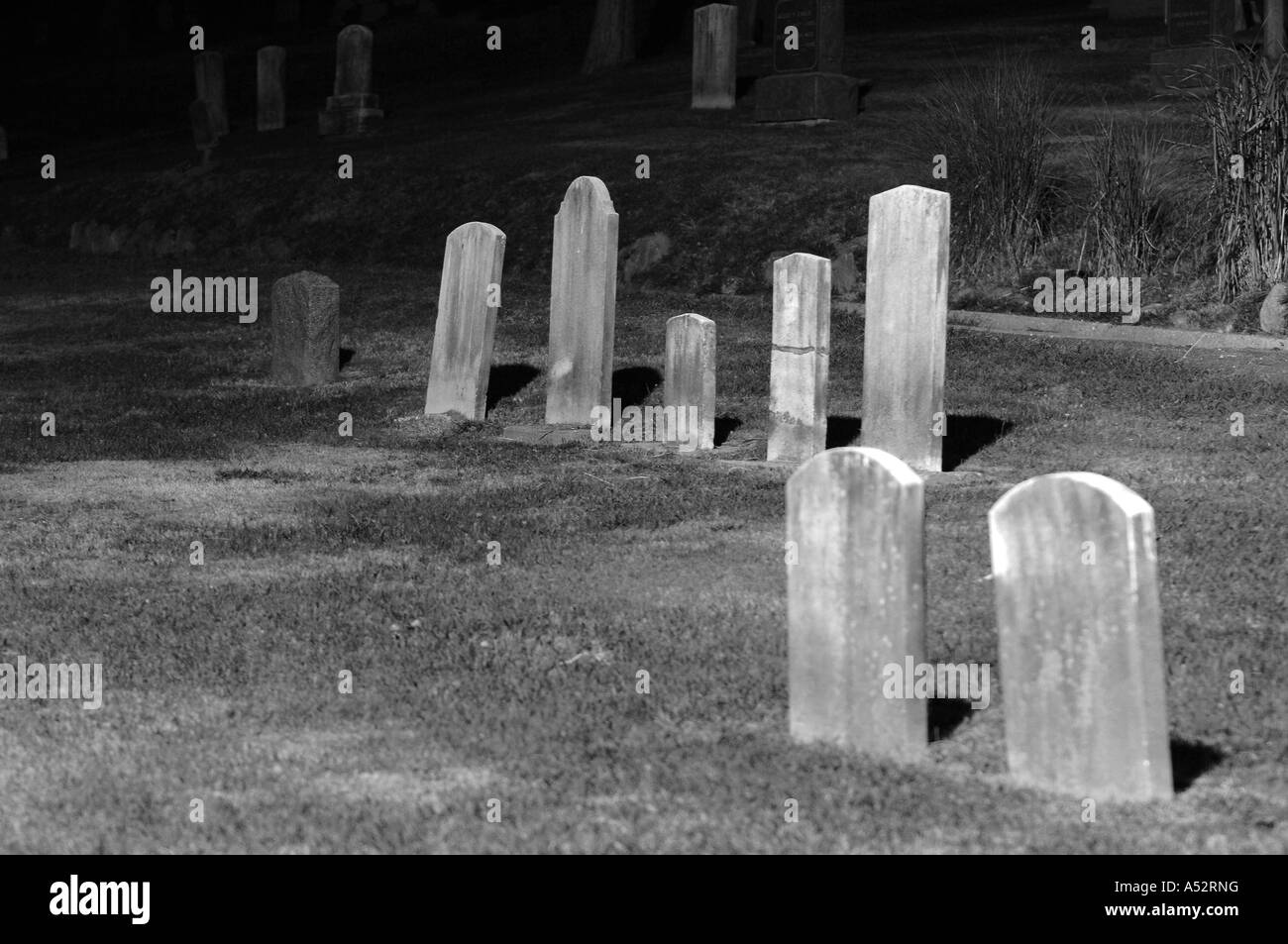 Aa black and white shot of some gravestones in a Long Island cemetery. Full description below. Stock Photo
