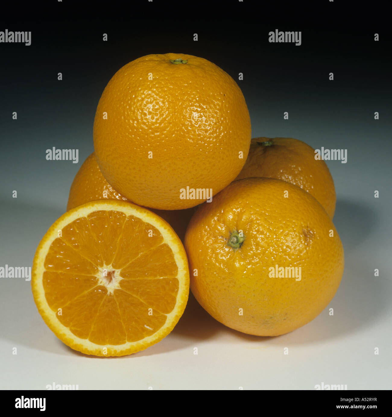 Whole sectioned citrus fruit orange variety Valencia Stock Photo Alamy