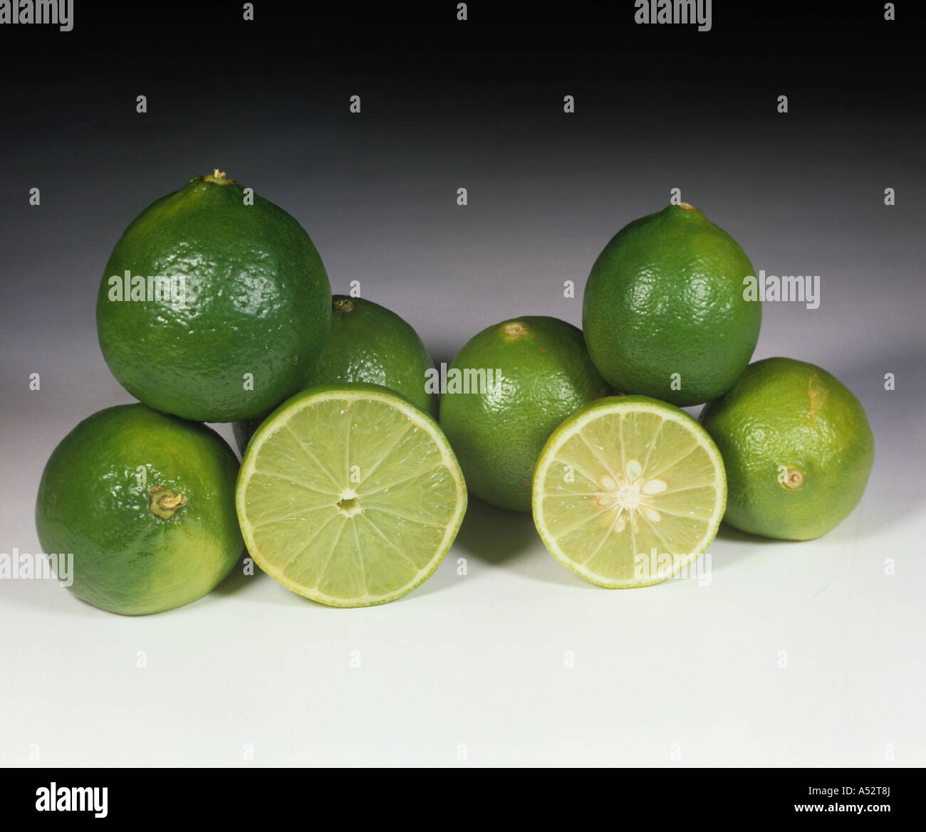 Whole sectioned lime fruit varieties West Indian Persian Stock Photo