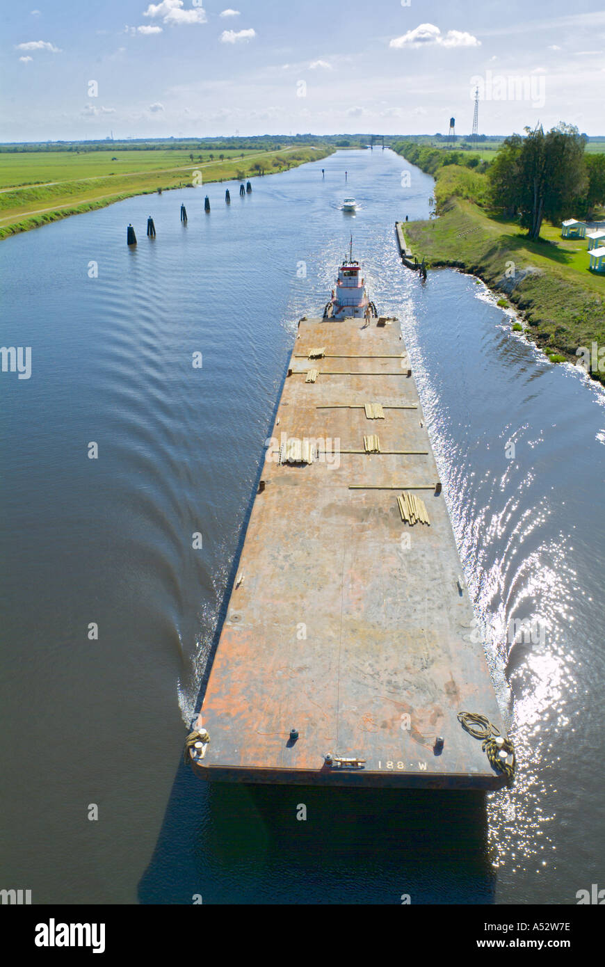 barge on the Saint Lucie Canal C 44 Okeechobee Waterway St shipping boating canals tug boat Stock Photo