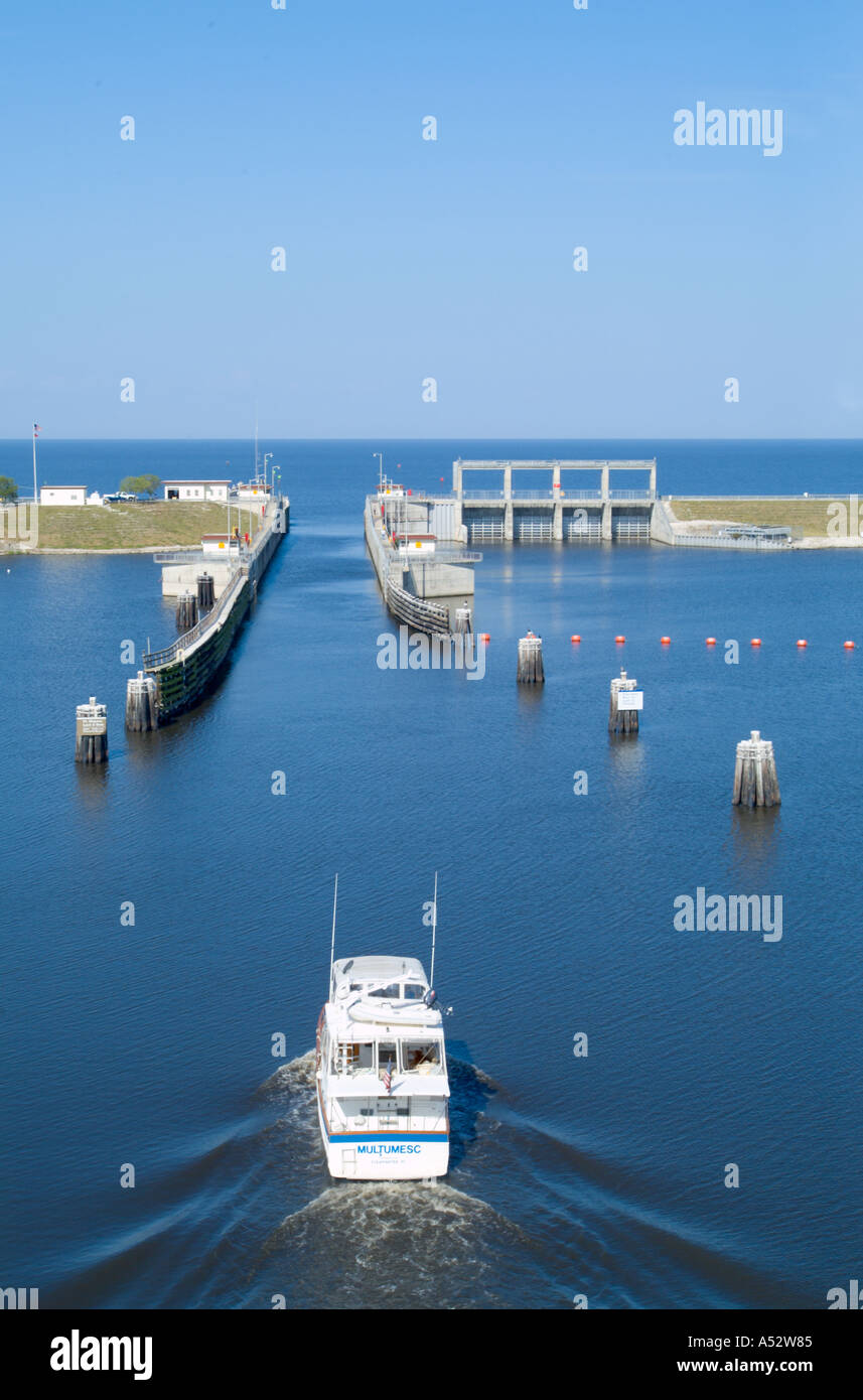 Boats pass through the Port Mayaka Lock on Lake Okeechobee from the Saint Lucie Canal Stock Photo