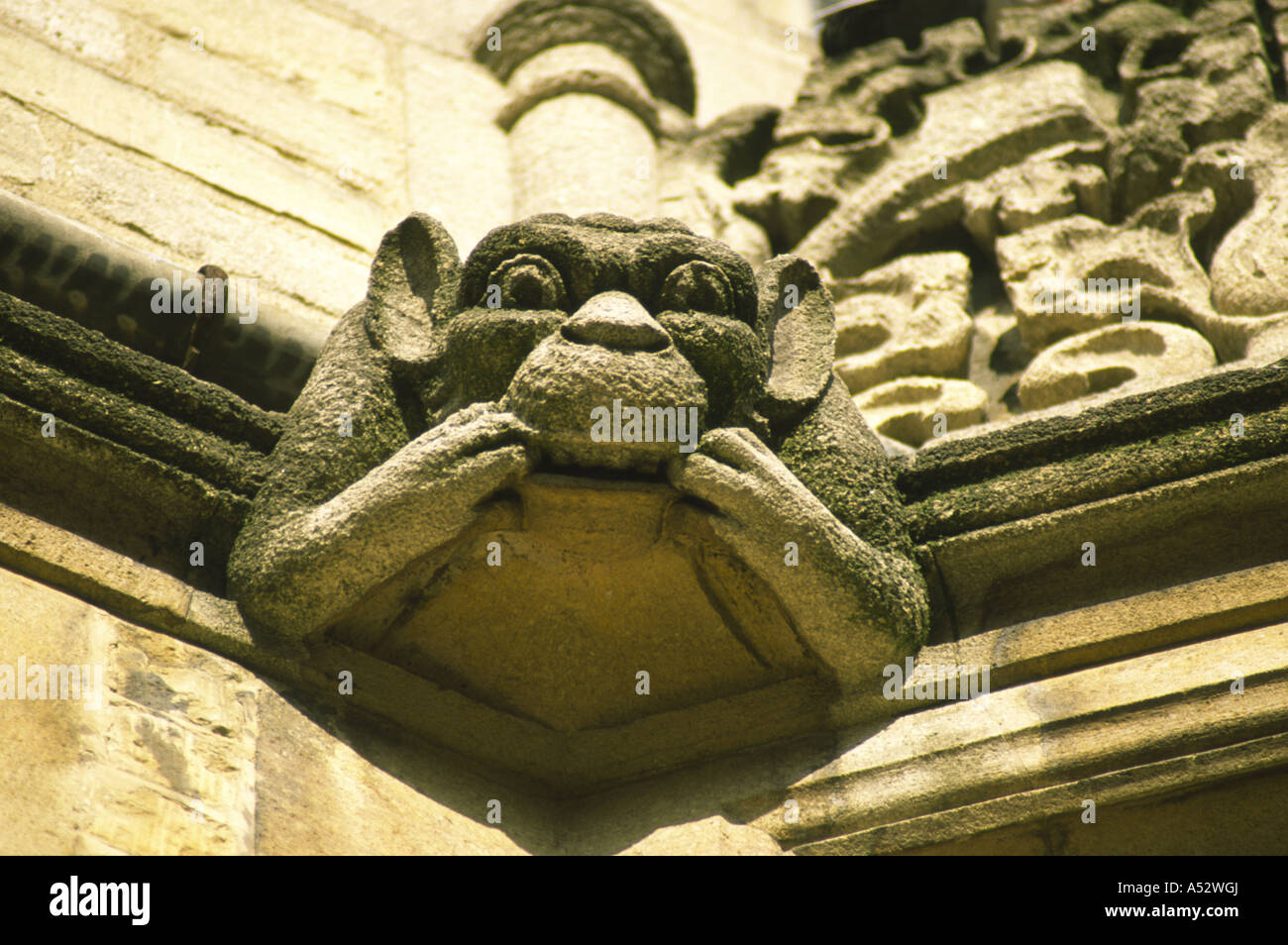 Oxford, UK : Nov 01 2003: Grotesque Carving of a Cheeky Monkey Pulling Faces on 1 Nov 03 at Magdalen College, Oxford University Stock Photo