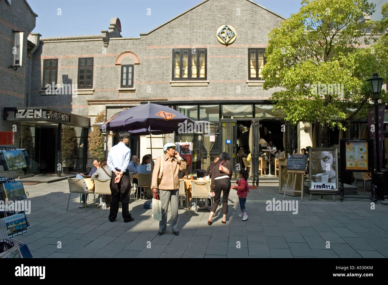 People using a restaurant in Xi Tian Di Square, Shanhai Stock Photo Alamy