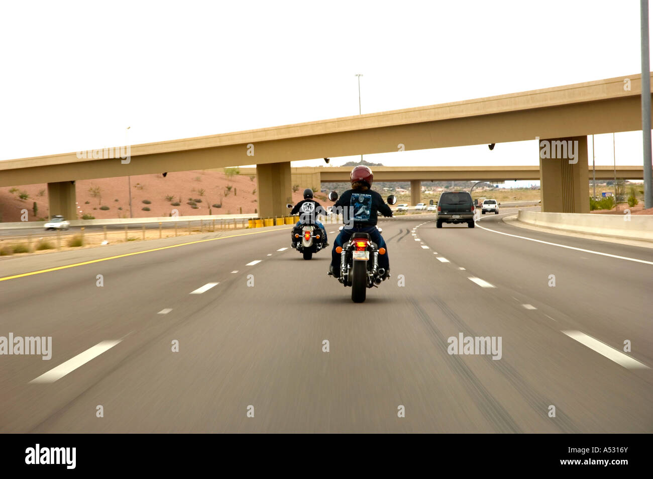 Motorcycles and other motor vehicles traveling on a U.S. highway. Space for copy. Stock Photo