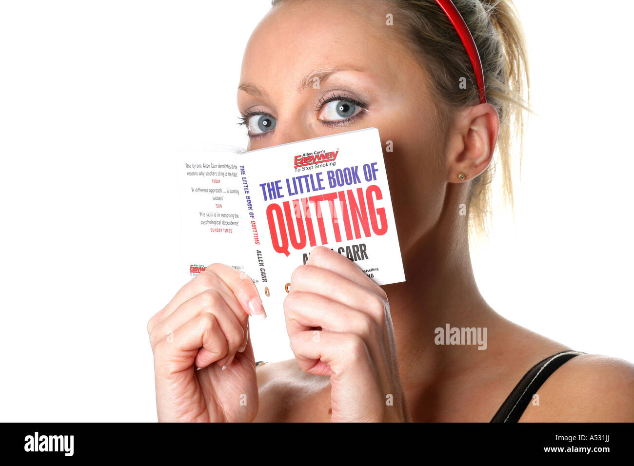 Young Woman Reading Quitting Smoking Book Model Released Stock Photo