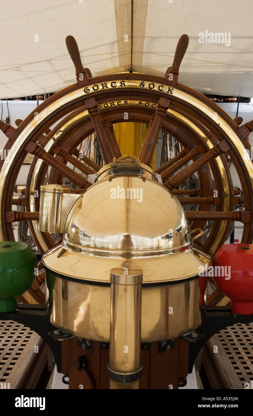 conventional Compass in front of the Helm on the german Tall ship Gorch Fock Stock Photo