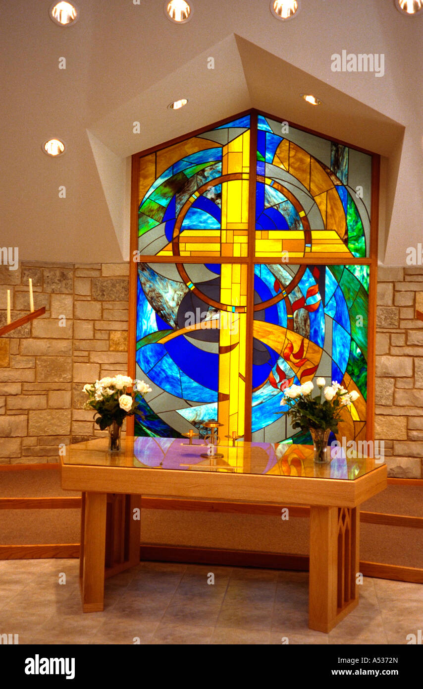 Stain glass window of cross and altar. Presbyterian Church of the Way