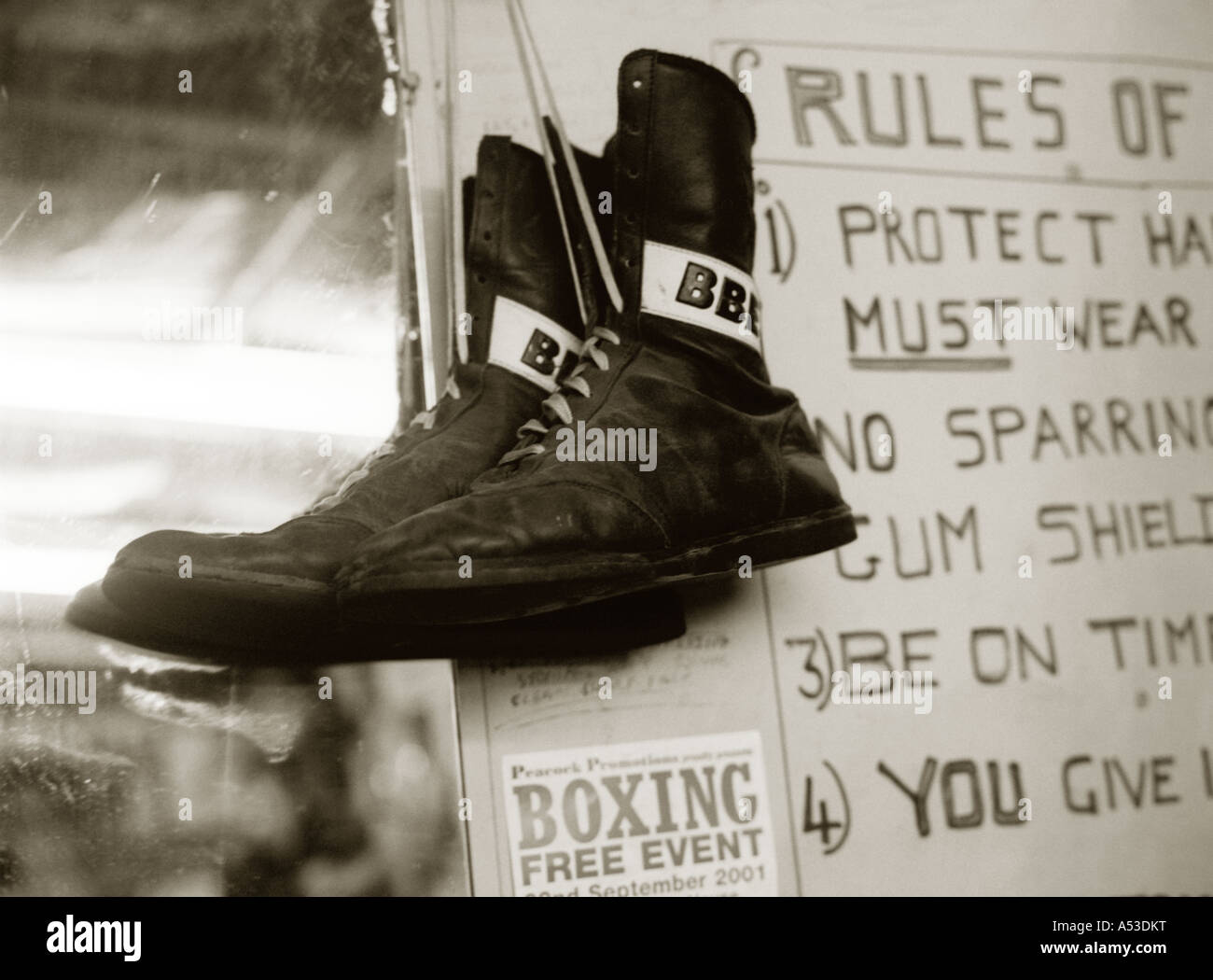 Tinted black and white landscape image of boxer`s boots Stock Photo - Alamy