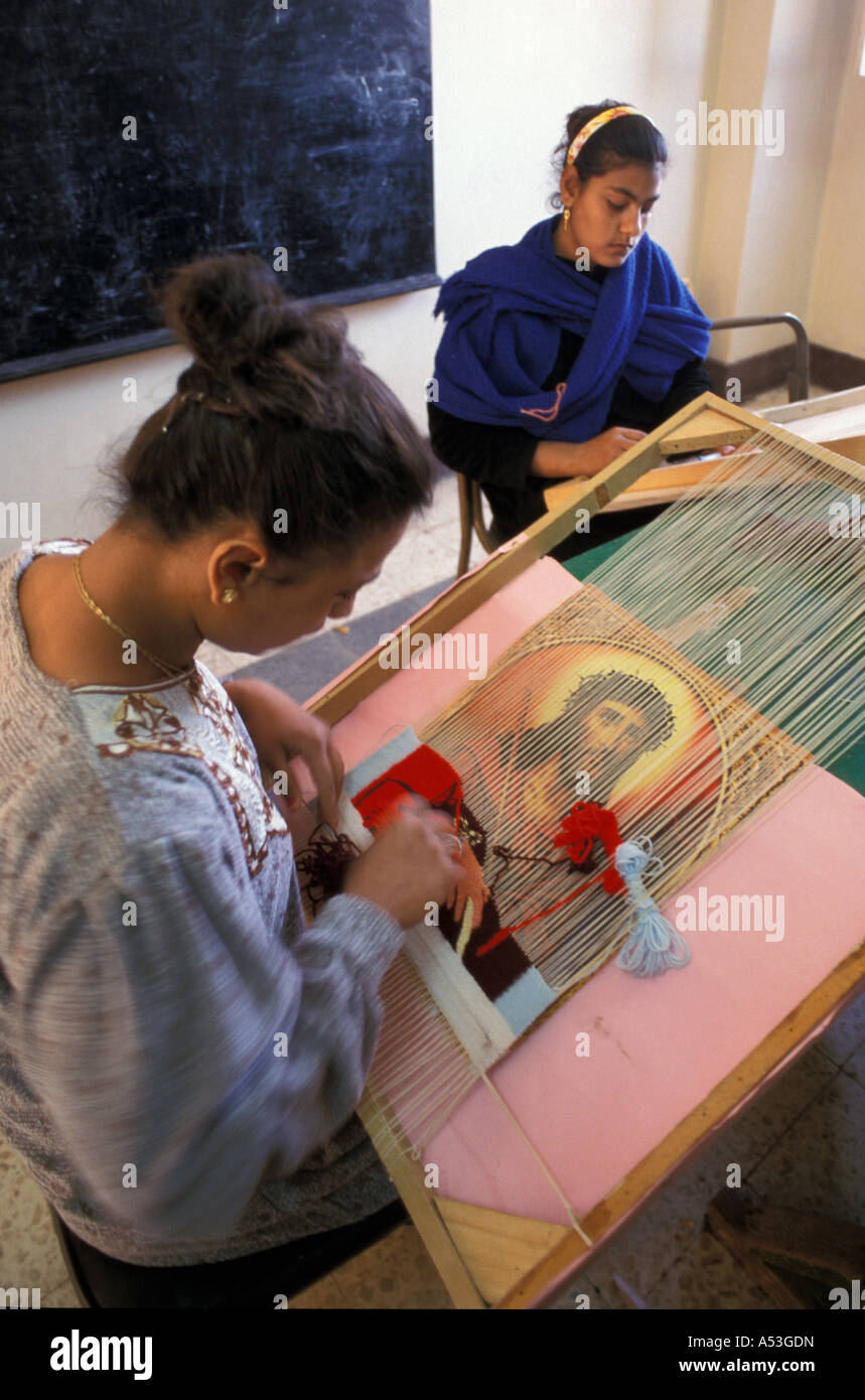 Painet ha0776 5734 egypt girls making tapestries catholic social services center manhari minya country developing nation Stock Photo