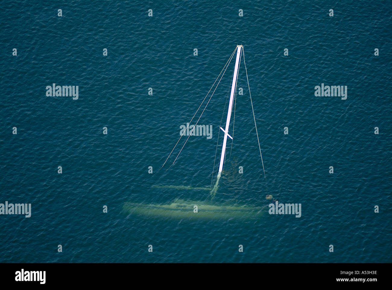 sunken sailboat boating bad luck founder boats loss costly Stock Photo