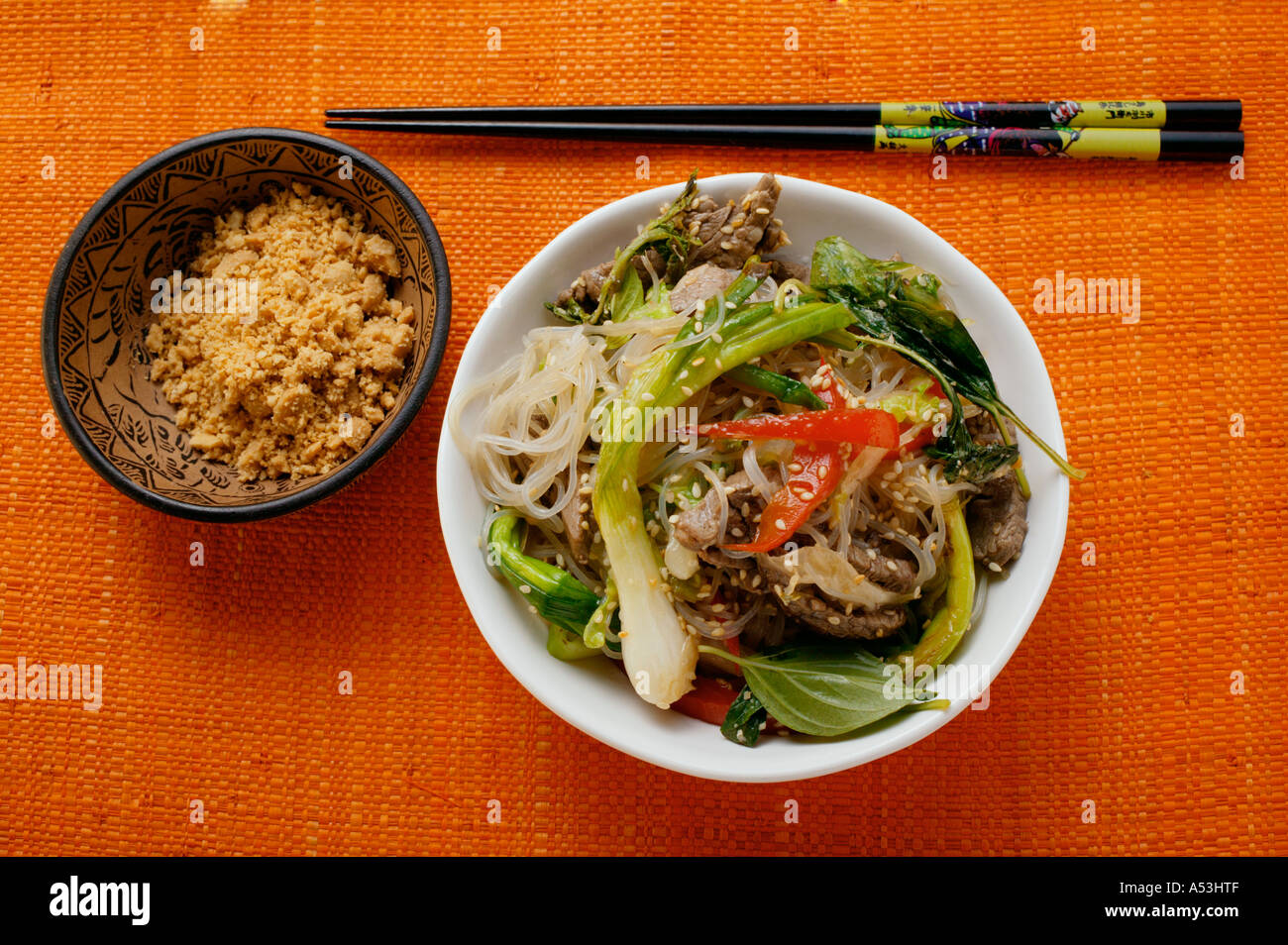 Glass noodles with beef and vegetables chopped peanuts Stock Photo Alamy