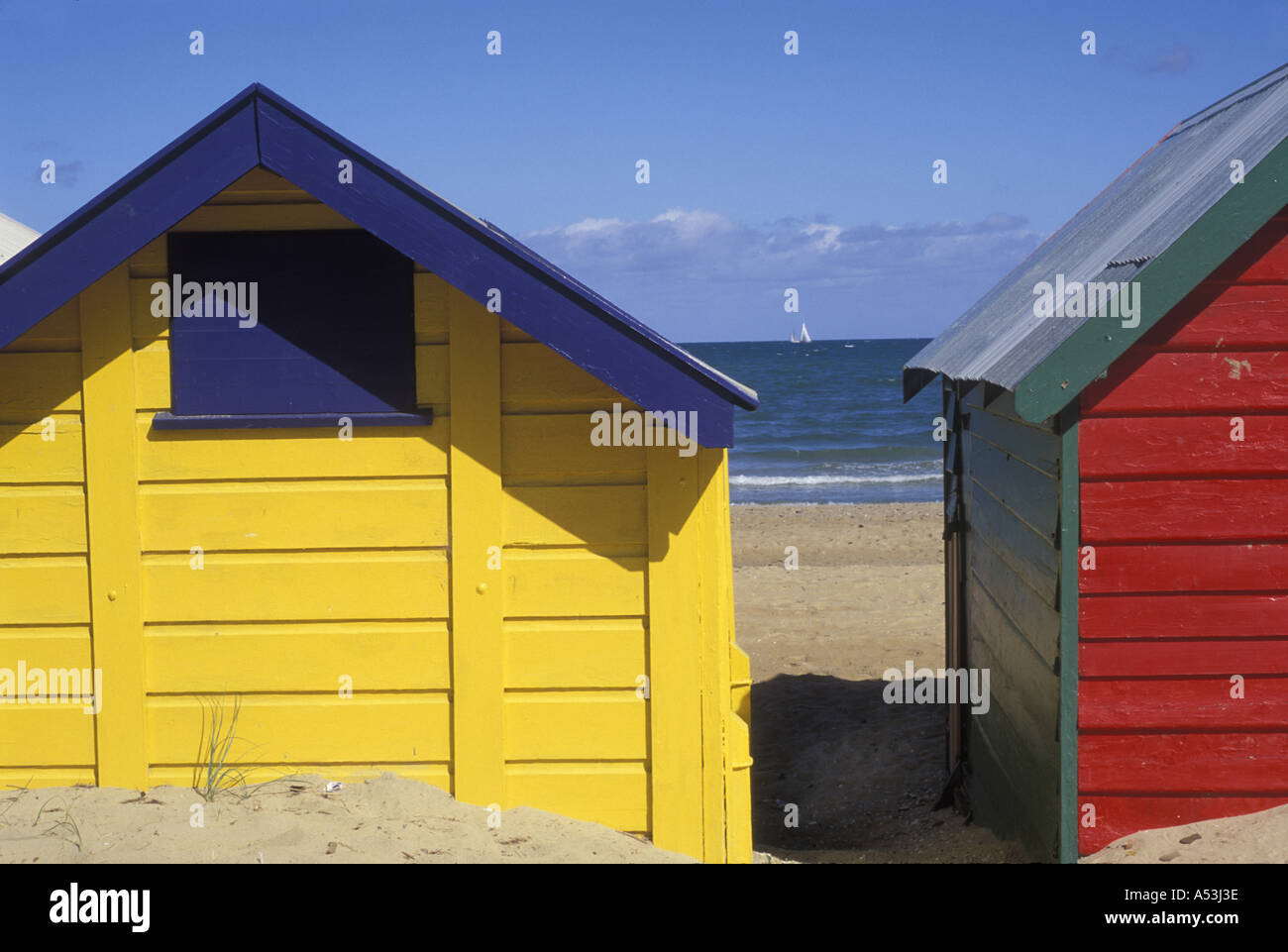 Australia Victoria Brightly painted beach houses line Brighton Beach in