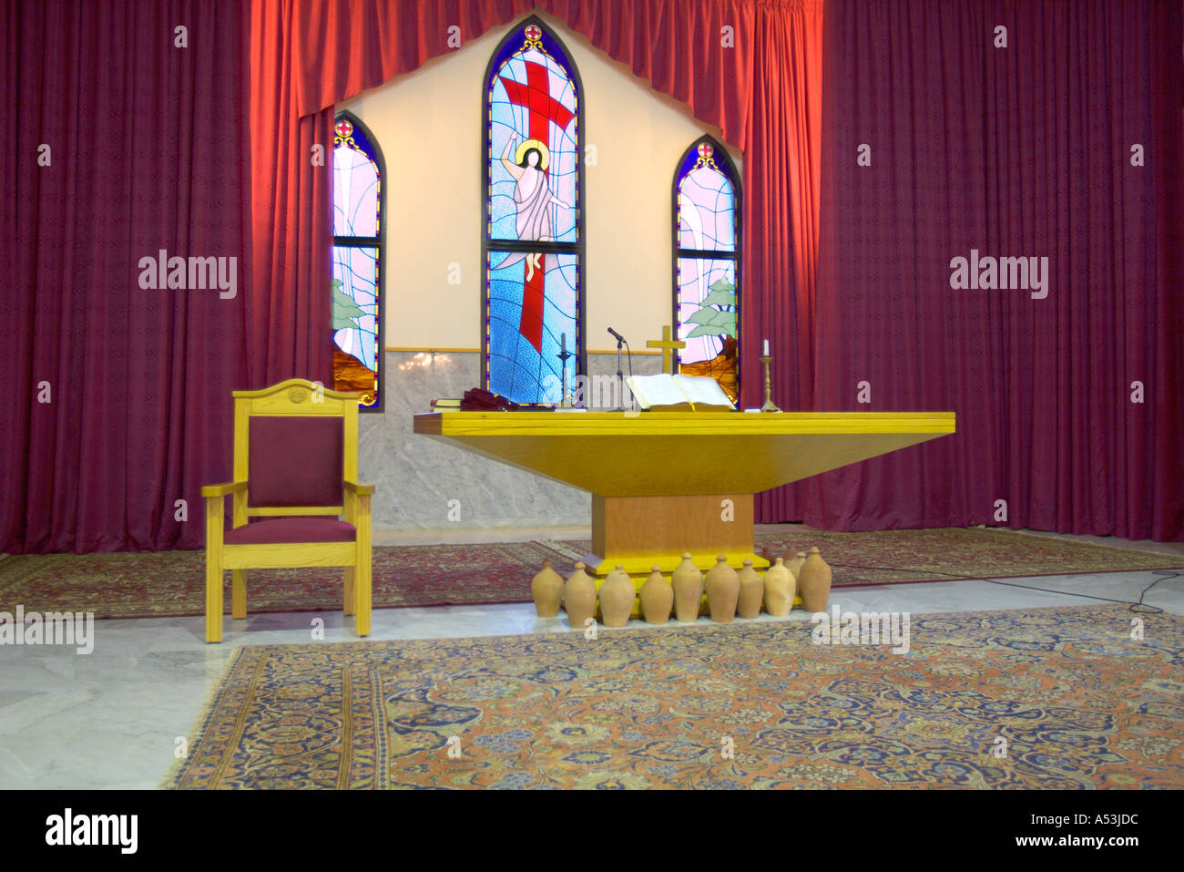 LEBANON BEIRUT Altar of Christian Protestant church in Beirut with Cedars of Lebanon stained glass windows Stock Photo