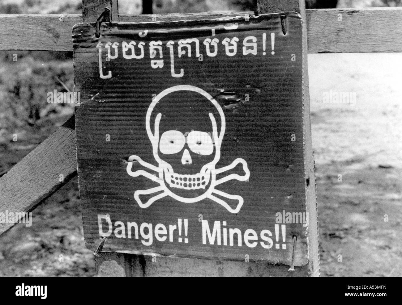 Painet ha1407 232 black and white war sign warning land mines siem reap cambodia country developing nation less economically Stock Photo