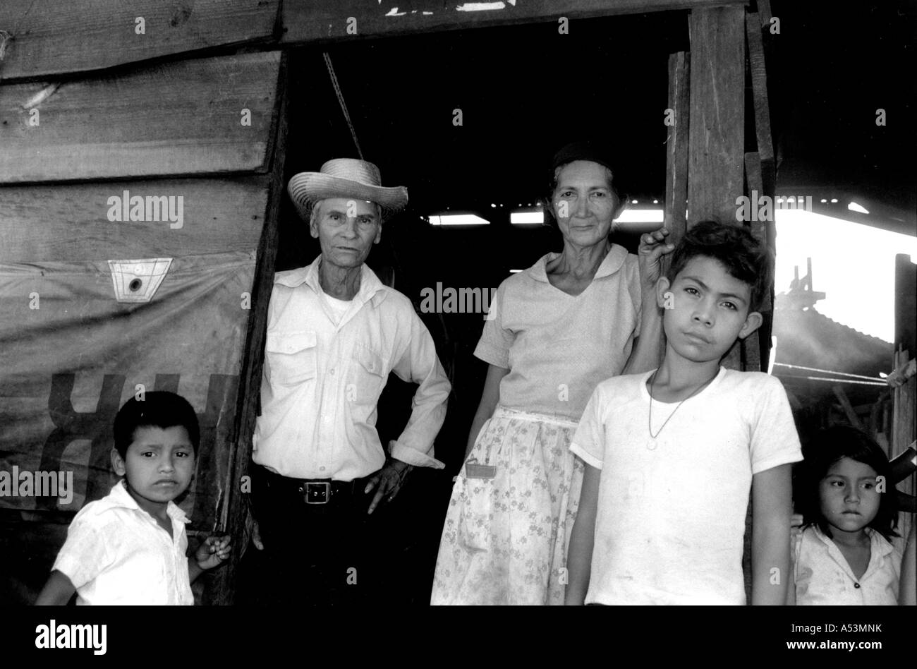 Painet ha1438 black and white family refugees colomocagua refugee camp honduras bw black-white municipality honduran Stock Photo