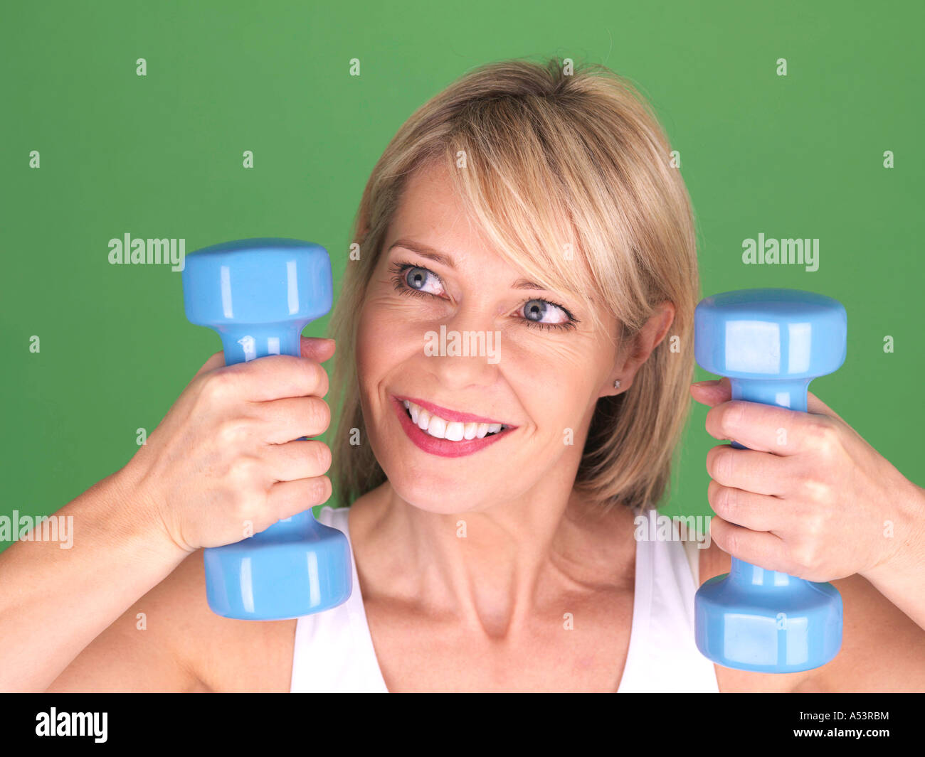 Healthy Body Conscious Woman Working Out In A Fitness Routine With ...