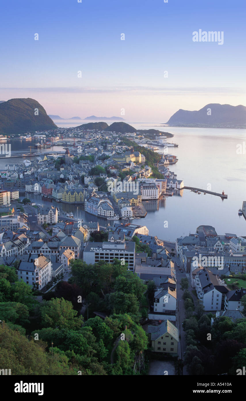 Houses and harbor at coastal town of Ålesund in northern Norway at sunrise Stock Photo