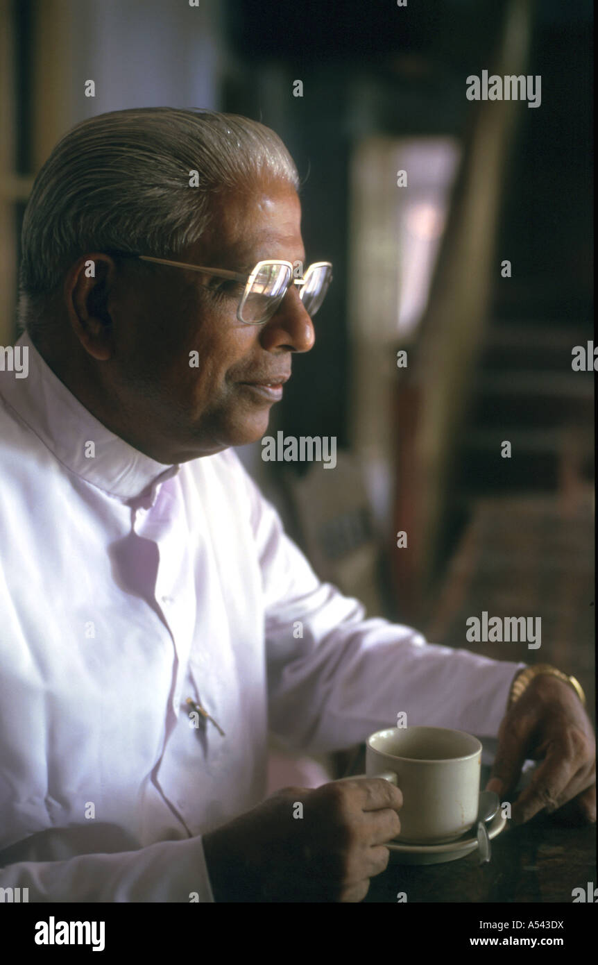 Painet ha2570 5411 india religion christian father kottayam kerala country developing nation economically developed culture Stock Photo