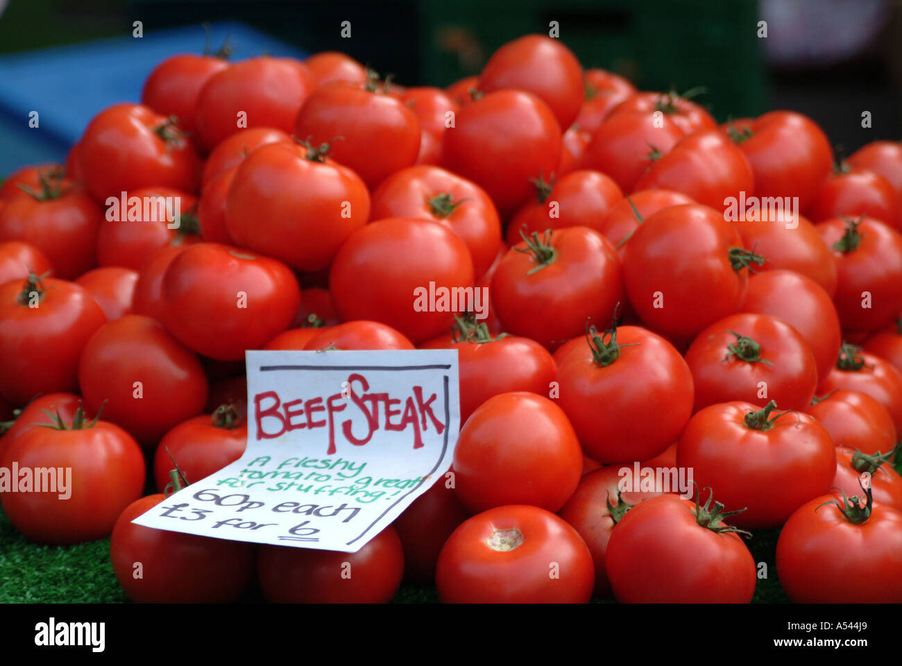 Beefsteak tomatoes on market stall Stock Photo Alamy