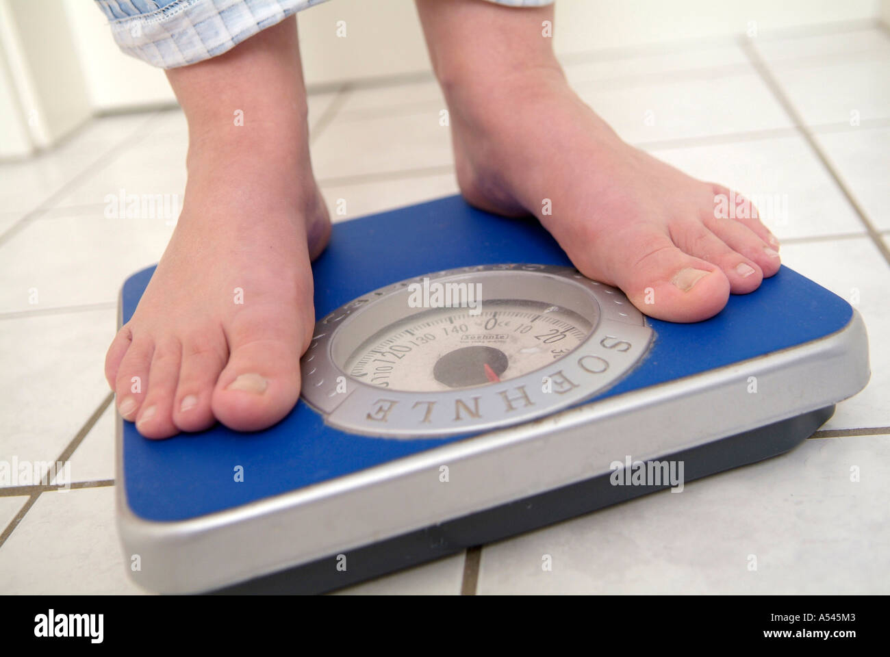 Woman with weigh Stock Photo