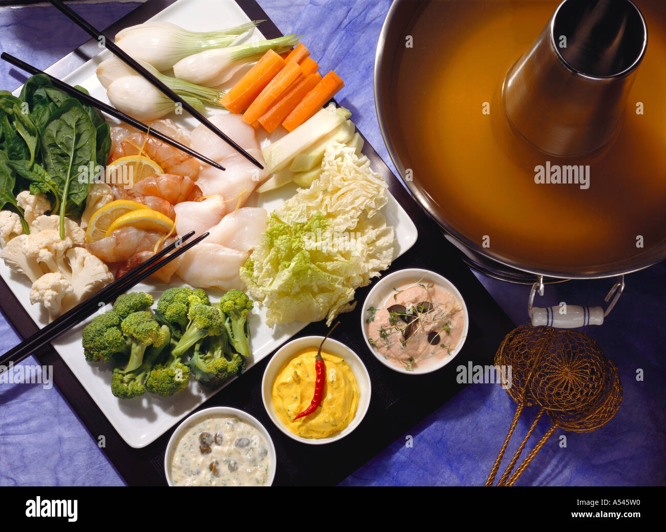 Vegetable Fondue with Fish Sauces Stock Photo Alamy