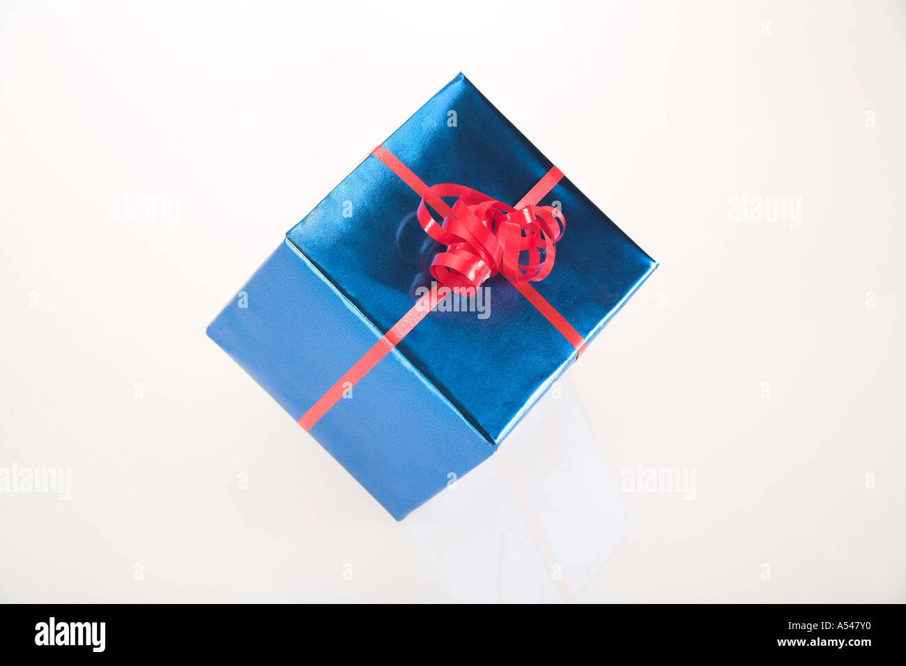 Present Front Present cut out in front of white background Stock Photo - Alamy